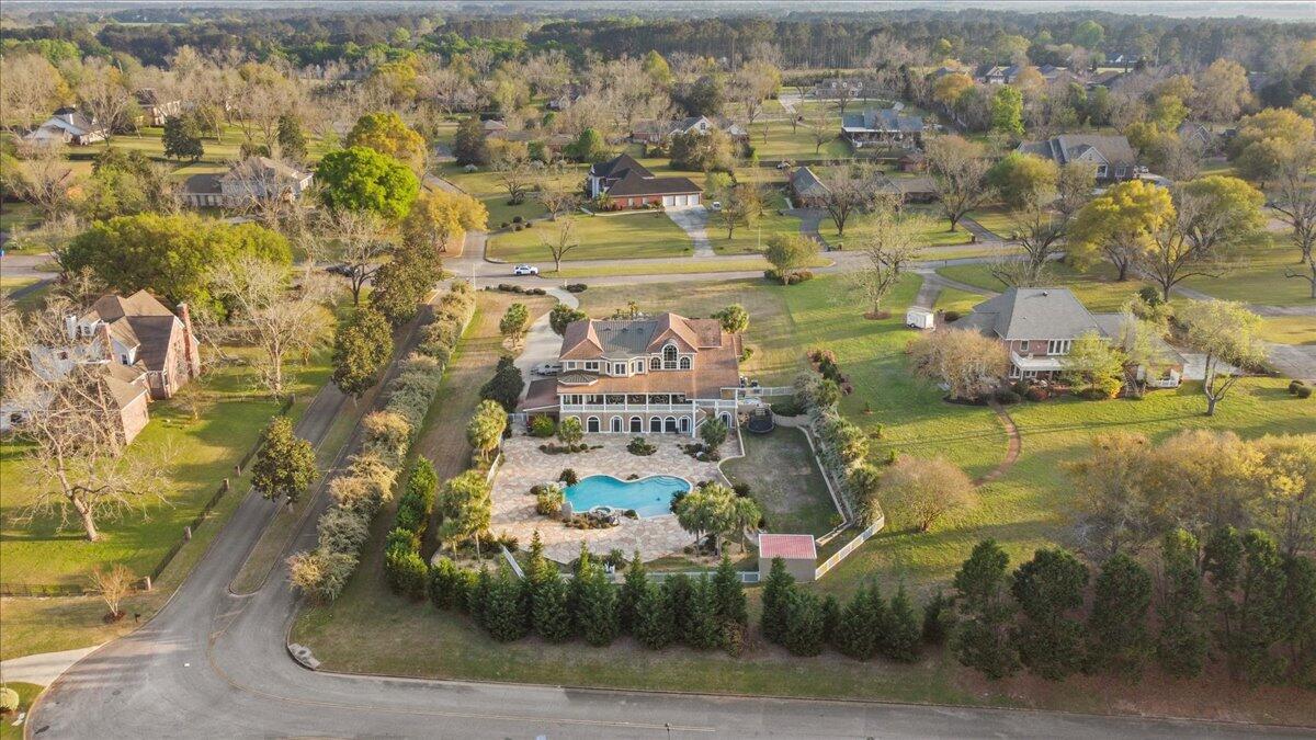 200 Asphodel Dr Dothan, AL 36303. This magnificent Mediterranean-style estate offers a resort-like lifestyle on 1.4 acres without ever having to leave home. Offering 11 Bedrooms and 7 Bathrooms, it seamlessly combines luxury, entertainment, wellness, and privacy, creating a home that is equally suited for everyday living and unforgettable gatherings.The walk-out lower level has functioned like a second residence, complete with its own full kitchen, theater, fitness room, sauna, dining area, private patio, and separate entrance--ideal for guests, extended family, or multi-generational living.
Our ENCO home theater has been the centerpiece for countless movie nights and sporting events, while the spacious Florida Room recreation wing provides incredible flexibility for entertaining, family activities, and large celebrations. Integrated smart-home displays throughout the home make it easy to play music, communicate between rooms, answer the front door, and control lighting, security, and other home features from multiple locations. The primary suite has always felt like a private spa retreat, featuring custom California Closets, a luxurious steam shower, Jacuzzi waterfall soaking tub, and direct patio access. Nearly 12-foot privacy hedges surrounding the property create a peaceful, secluded setting rarely found. One of the home's most distinctive features is the spectacular custom 500-gallon saltwater aquarium, designed and built by the team from the television show Tanked.  Enhanced with more than $50,000 in upgrades and a custom real reef design, it serves as a stunning focal point unlike anything else. The detached outbuilding with running water offers exceptional flexibility and future potential as a guest house, home office, art studio, workshop, or pool house.
The location has been another favorite feature--directly across from the Robert Trent Jones Golf Trail, just minutes from the airport with convenient nonstop flights to Atlanta, and approximately 90 minutes from the white-sand beaches of Destin and Panama City Beach.
Above all, this home has provided the perfect balance of luxury, comfort, privacy, and recreation, making every day feel like a vacation.