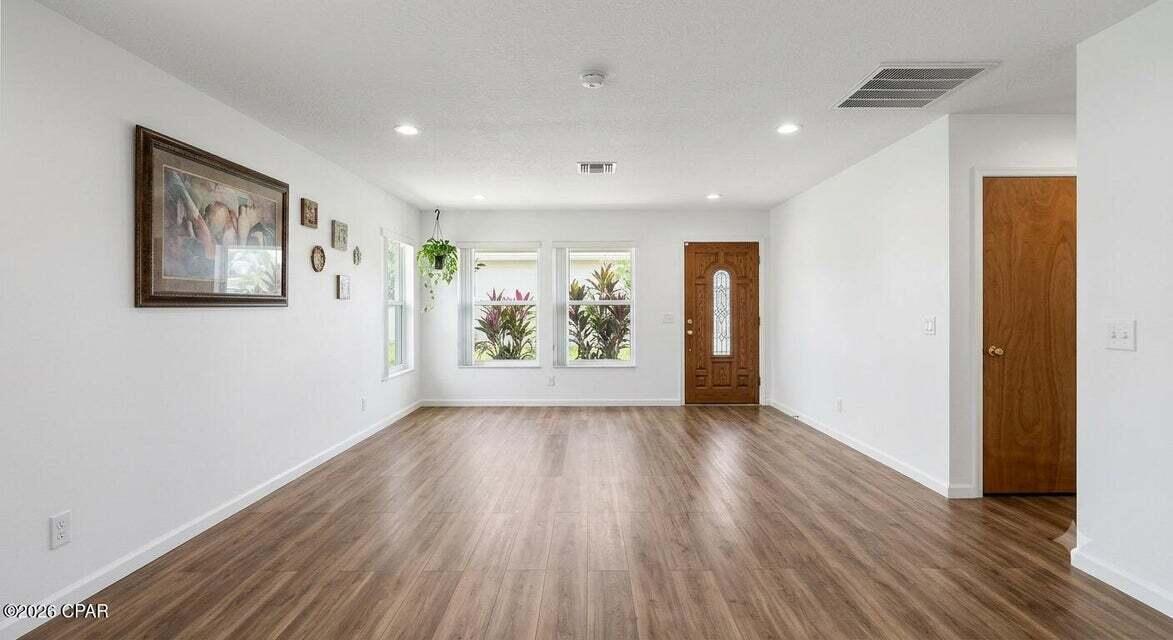 Calling all first-time homebuyers and investors! This move-in-ready 2-bedroom, 2-bath attached home is full of potential and ready for your personal touch. Whether you're looking for an affordable place to call home or your next investment opportunity, this property offers the chance to add your own style while building equity.



A standout feature is the detached shed, complete with electricity, internet, and soundproofing--making it the perfect home office, workshop, studio, or hobby space. Additional updates include a updated LVP flooring throughout the home 2022 and 2023 water heater. The home is connected to city water and sewer. 



A rare bonus is the ability to park a small RV, boat, or jet skis in your backyard with access through the city easement located one unit over, providing added convenience for outdoor enthusiasts.


Ideally located in the heart of Lynn Haven, you'll be just minutes from shopping, restaurants, schools, parks, and everyday amenities. Don't miss this opportunity to own a home with incredible potential in a prime location!