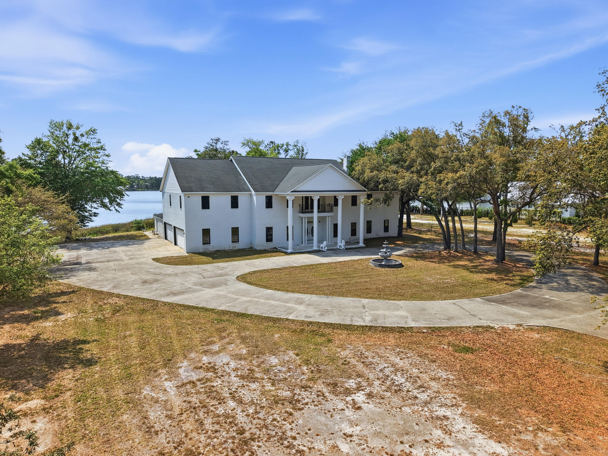 A rare opportunity to create a private waterfront estate in Freeport, featuring an incredible 282 feet of frontage along Mallet Bayou and 2.43 acres spanning three lots. The home sits on two parcels, with a third vacant lot offering the flexibility to build, sell, or preserve for ultimate privacy. This estate is a true blank slate ready for transformation, with sheetrock in place, new windows and doors installed, and a freshly painted exterior already completed. Envision resort-style living with a pool, hot tub, sauna, multiple refinished fireplaces, and a spacious 4-car garage. With major improvements already underway, this is your chance to design a one-of-a-kind waterfront retreat and bring your dream vision to life.