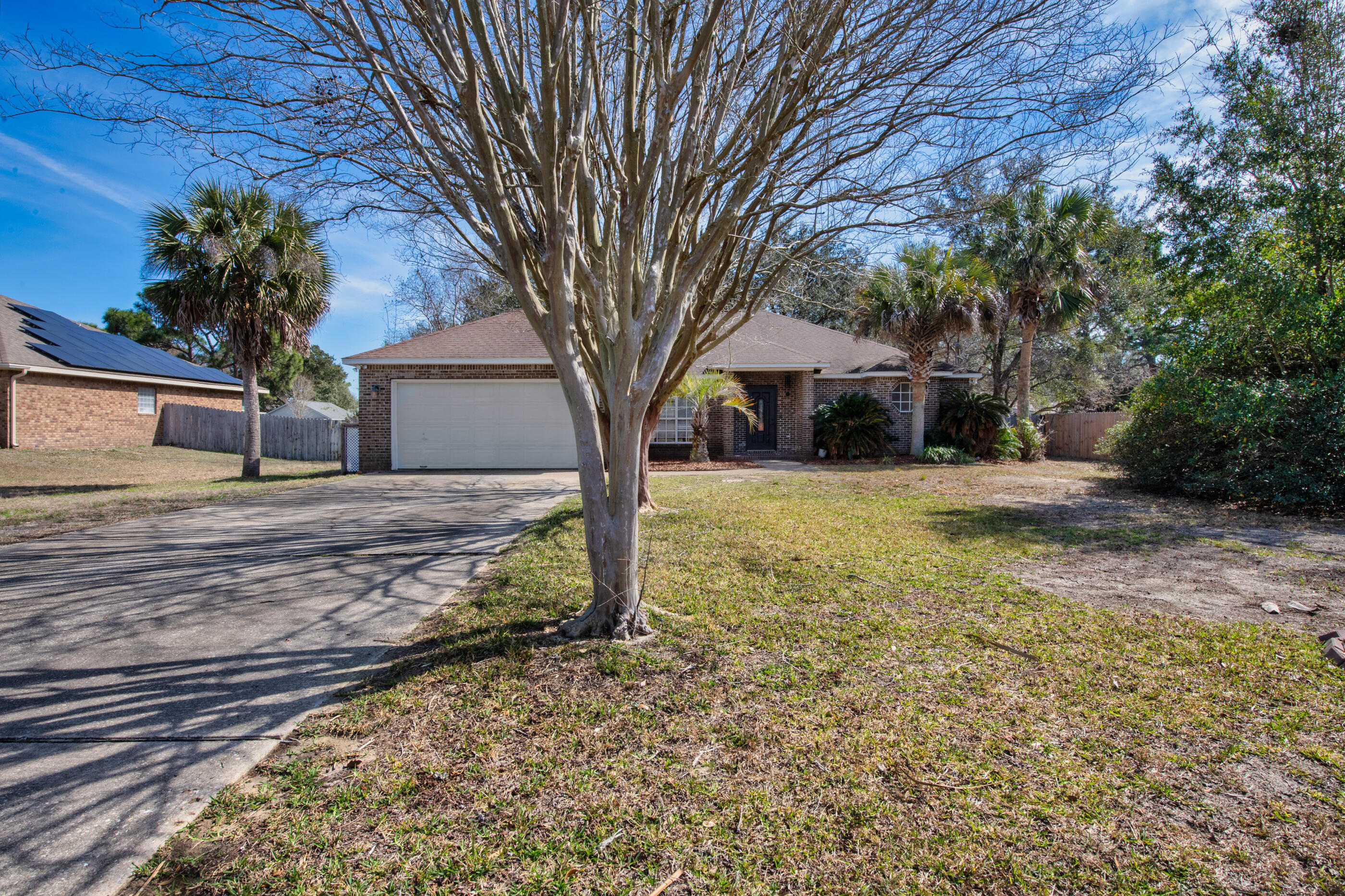 Seller is going above and beyond to make this an unbeatable opportunity -- offering a brand-new roof, flooring allowance, paint allowance, and a home warranty with an acceptable offer! Talk about peace of mind and instant value.

Step inside and discover a home filled with space and endless potential. With TWO separate living areas plus a versatile flex room, you'll have room for a home office, playroom, media space, or whatever fits your lifestyle.

The kitchen is designed for both function and gathering, featuring stainless steel appliances, abundant cabinet storage, and a spacious pantry to keep everything organized. Retreat to the oversized primary suite complete with a massive walk-in closet, double vanity sinks, a relaxing garden tub, and a separate shower -- your own private escape at the end of the day.

Major systems have already been updated, including the HVAC (2015) and water heater (2021), giving you added confidence.

Outside, enjoy a huge fully fenced backyard with plenty of space to entertain, garden, or simply unwind.

All of this in a convenient location close to beaches, schools, and shopping -- making everyday living easy and enjoyable.

This home truly offers space, flexibility, and incredible seller incentives -- an opportunity you don't want to miss!