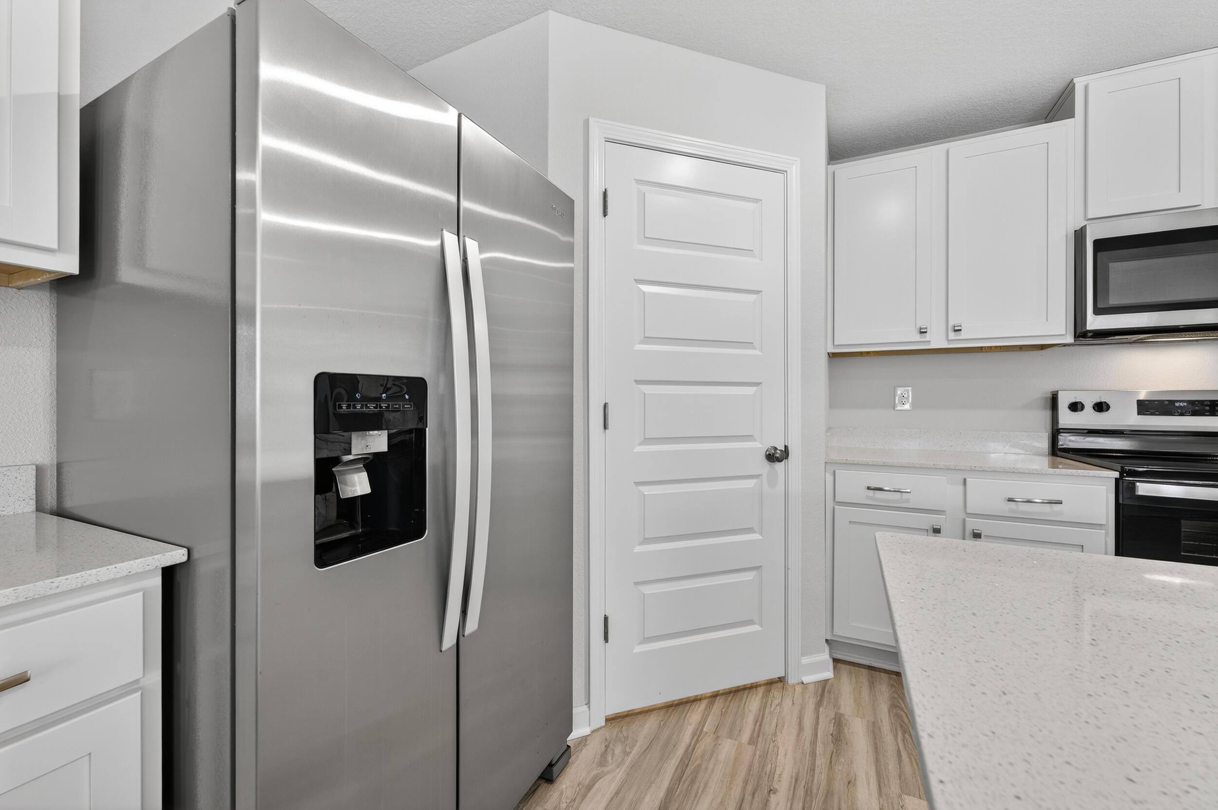 ***10k in closing cost assistance***AWESOME LIKE NEW construction on a corner lot in the Silver Lake Village Community. The home has an open design with 4 beds, 2 baths, covered back patio, 2-car garage & a Smart Home Connect System with several convenient devices. A well-designed kitchen offers relaxed living impressive QUARTZ countertops, lg. island bar, quiet dishwasher, beautiful stainless appliances, pantry, & spacious dining area.  Bedroom 1 & the adjoining bath feature a large walk-in closet, extra storage closet, double sinks, QUARTZ countertops & a large shower. Striking (EVP) wood-look flooring throughout the whole house. Durable Hardie exterior and a fenced in yard adds to the GREAT curb appeal located in a fast-growing area.  Easy drive to the airport, military base, Ft. Walton/Destin area and beaches