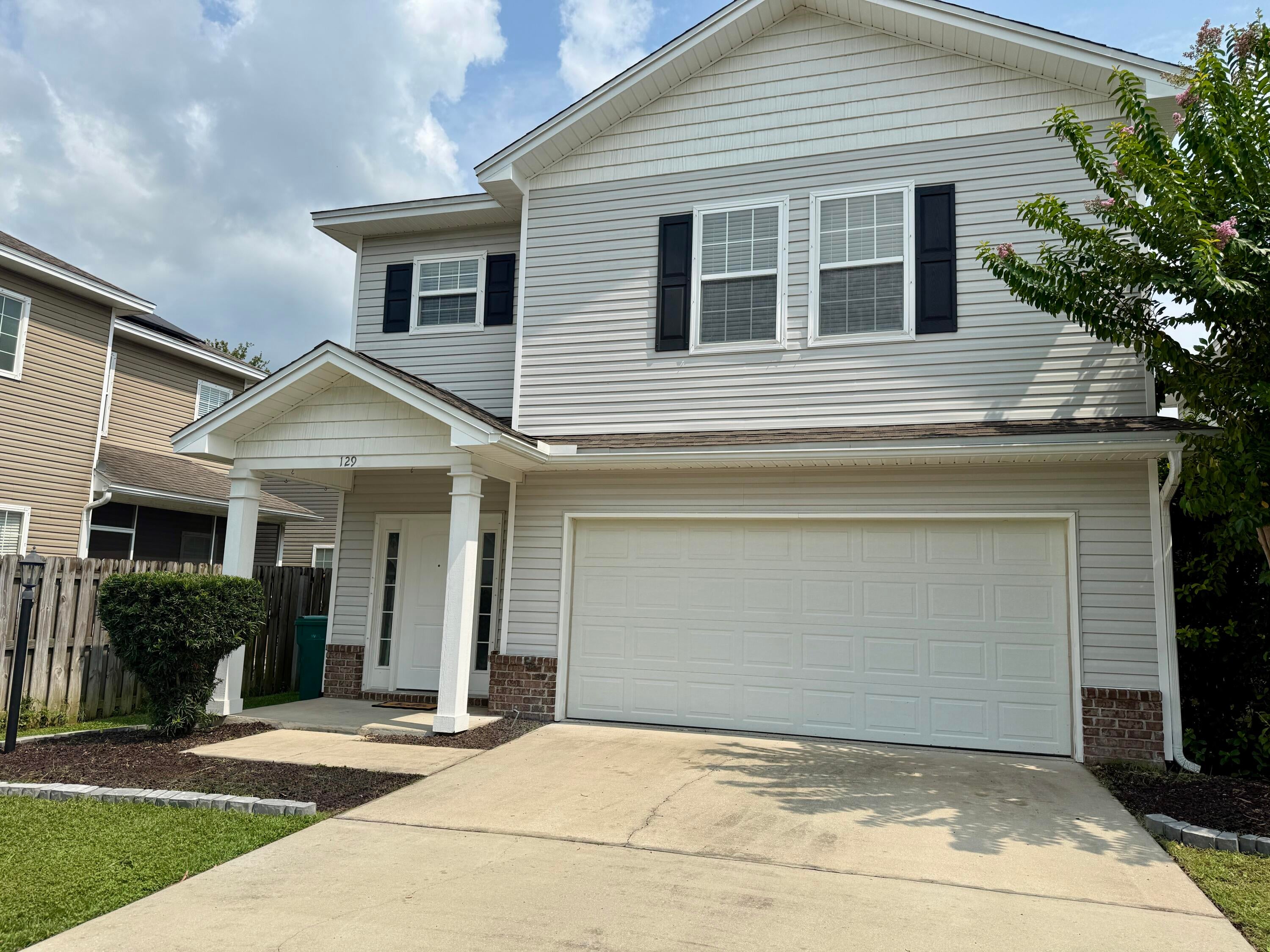 Extremely rare VA assumable loan at 2.25 PERC! This home features 4 bedrooms, 2.5 bathrooms, 2,127 sq ft., and is centrally located in the heart of Niceville, just minutes from schools, shopping, restaurants, and Eglin Air Force Base. Zoned schools include Plew Elementary, Ruckel Middle, and Niceville Senior High. This home features all-new Luxury Vinyl Plank flooring throughout common areas and bedrooms, tile in the bathrooms and laundry room, a freshly tiled primary suite shower with an oversized rainfall showerhead, and updated lighting fixtures and ceiling fans throughout. 9-ft ceilings enhance the spacious, open floor plan while the kitchen offers plenty of counter space, tall cabinets, granite countertops, and stainless steel appliances. Abundant storage options and a dedicated laundry room with a utility sink make cleaning and organizing a breeze. The large garage includes racks for hurricane shutters and a convenient Tesla electric vehicle charging station hookup.