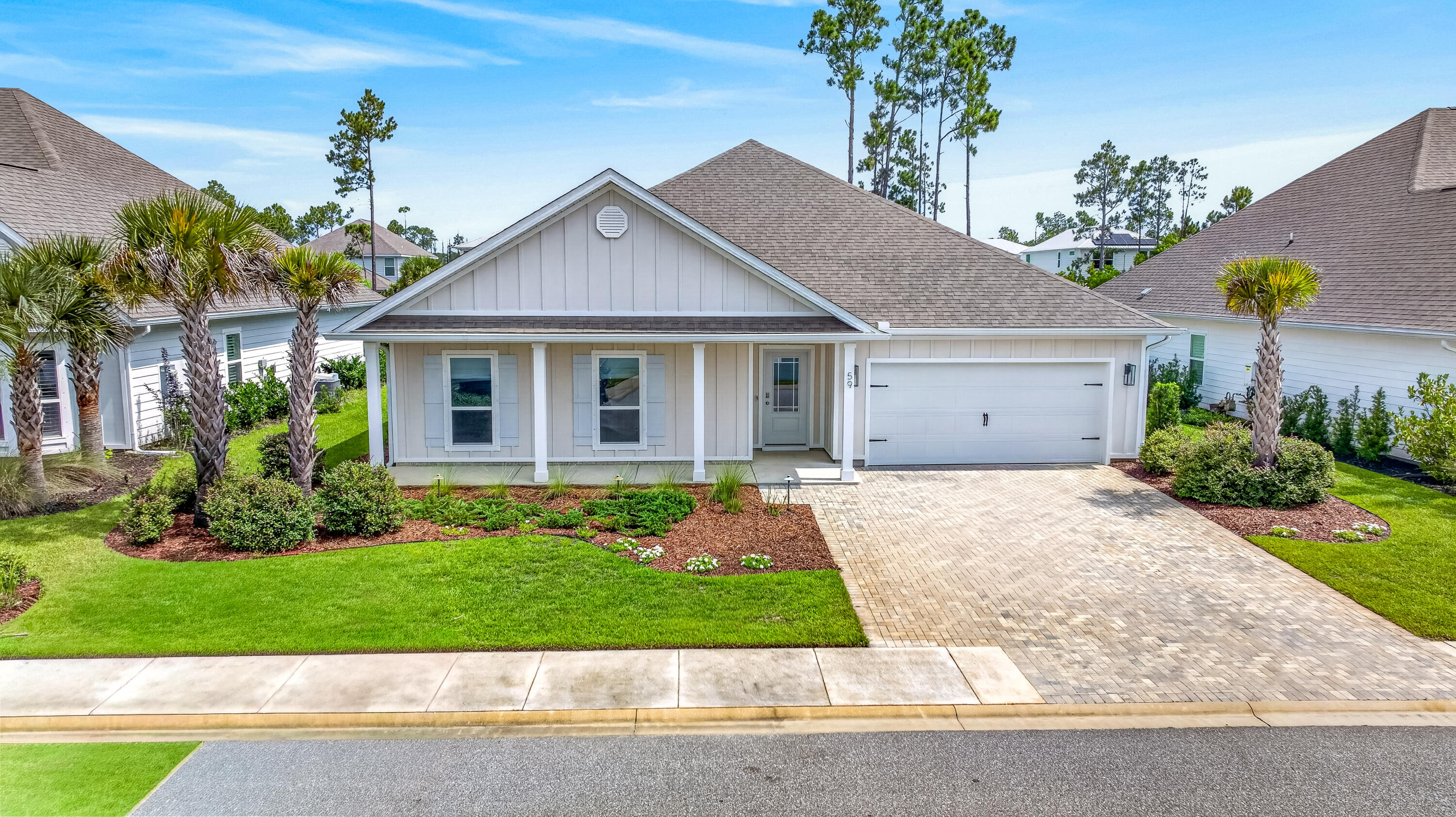 Welcome to 59 Lake Park CV - Coastal Living in Sought-After Lakeview Estates. Nestled in the desirable Lakeview Estates community of Santa Rosa Beach, this beautifully maintained 4-BR, 2.5-BA home offers the perfect blend of comfort, privacy & 30A convenience. Built new in 2021, this home has been thoughtfully upgraded by its original owners & is move-in ready. Open-concept living & kitchen area features a stunning marble backsplash & a wall-mounted 77'' LG G3OLED evo 4K smart TV - included with the home - for an incredible entertainment experience. Spacious primary bedroom includes a custom California Closet system designed for effortless organization. 2 car garage provides ample parking & storage. Step outside to a screened back porch complete with a wall-mounted 60'' TV - ideal for watching the big game or streaming your favorite shows while enjoying Florida's year-round outdoor living. Porch opens onto a large brick paver deck, perfect for grilling, entertaining or simply unwinding under the evening sky. Lakeview Estates is a quiet, rental-restricted community of just 57 homes, situated south of Highway 98 off Thompson Dr. Residents enjoy a community pool, walking & jogging paths & a beautiful 4-acre stocked, spring-fed lake with fountain. A private walkway leads to the adjoining Helen McCall Park, & the sugar-white beaches & shops of Scenic Highway 30A are just a short golf cart ride away. Rare opportunity to call one of 30A's most family-friendly neighborhoods your home