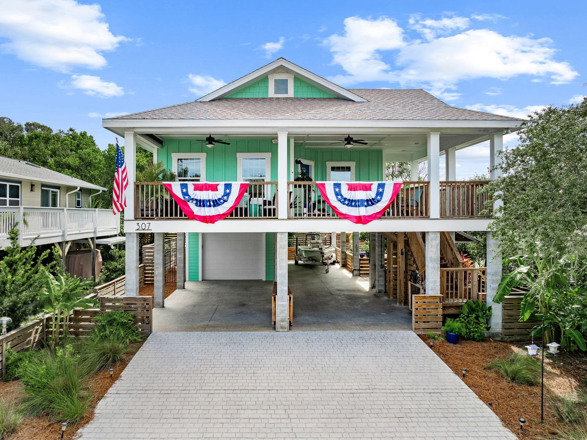Custom built in 2023 and engineered to last, this 3 bedroom 2 bath home is perfectly situated for beach lovers looking for a home designed for living.
Steps to the beach on the quiet west end of Panama City Beach with NO HOA, short term rental eligible, and offered furnished and move-in ready!
Designed with the Florida lifestyle in mind, there is abundant parking and space store your recreational toys under cover - plus a deep oversized one-car garage that is tall enough to accommodate large vehicles with built in work space and sink. Upstairs you'll find 500 SF covered deck, perfect for enjoying the gulf breeze any time of day. 
Inside, the open concept living area gives a feeling of luxurious comfort bathed in  natural light. Beyond you have two generously sized guest bedrooms and a shared full bath and the primary suite with space-saving barn closet doors and en-suite bath with step-in shower. 
The location is a perfect blend of laid back beach vibe and convenience.
Less than a mile to local favorites Thomas Donuts and The Carousel market plus:
• 3 miles to Pier Park
• 4.5 miles to Publix & Aldi
• 5 miles to Lake Powell boat launch
• 7 miles to 30Avenue Shops
• 7.5 miles to Rosemary Beach
• 14 miles to NW Florida Beaches International Airport

Extra touches include the outdoor shower, lower level seating areas, flip up table for grilling or cleaning the day's catch, and a fully fenced yard with adjustable gates to enclose the carport for added outdoor entertaining space.