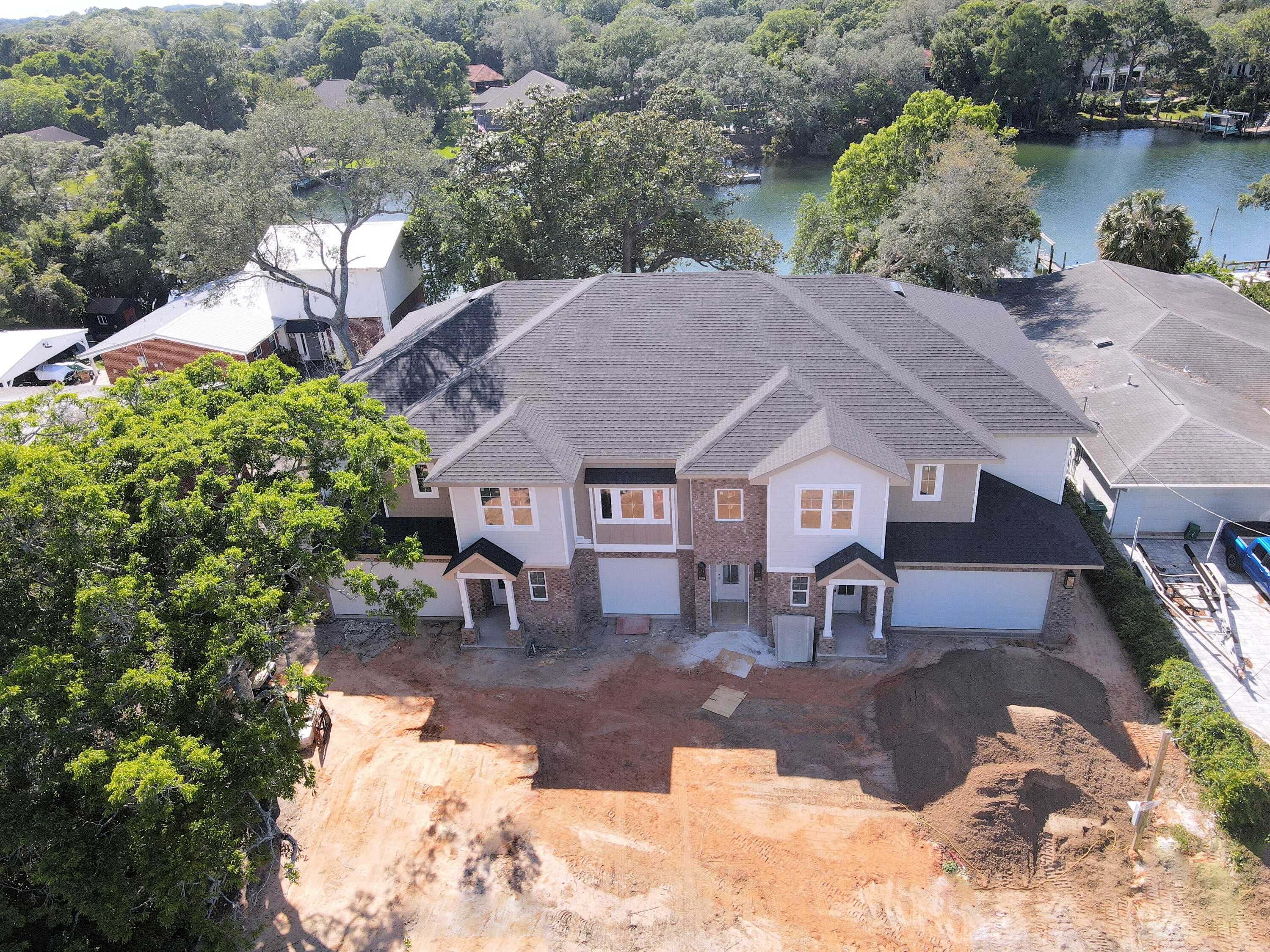 Discover waterfront living in a brand new townhome with a deeded boat slip in the heart of Fort Walton Beach. Designed for modern living, the open-concept main level features a spacious kitchen, living room and master bedroom suite on the first floor. Upstairs, two guest bedrooms are complemented by a versatile loft or flex area and a private balcony overlooking the water. Seller is offering $15,000 'Flex Cash' towards Buyer's closing costs, rate buy down, etc.