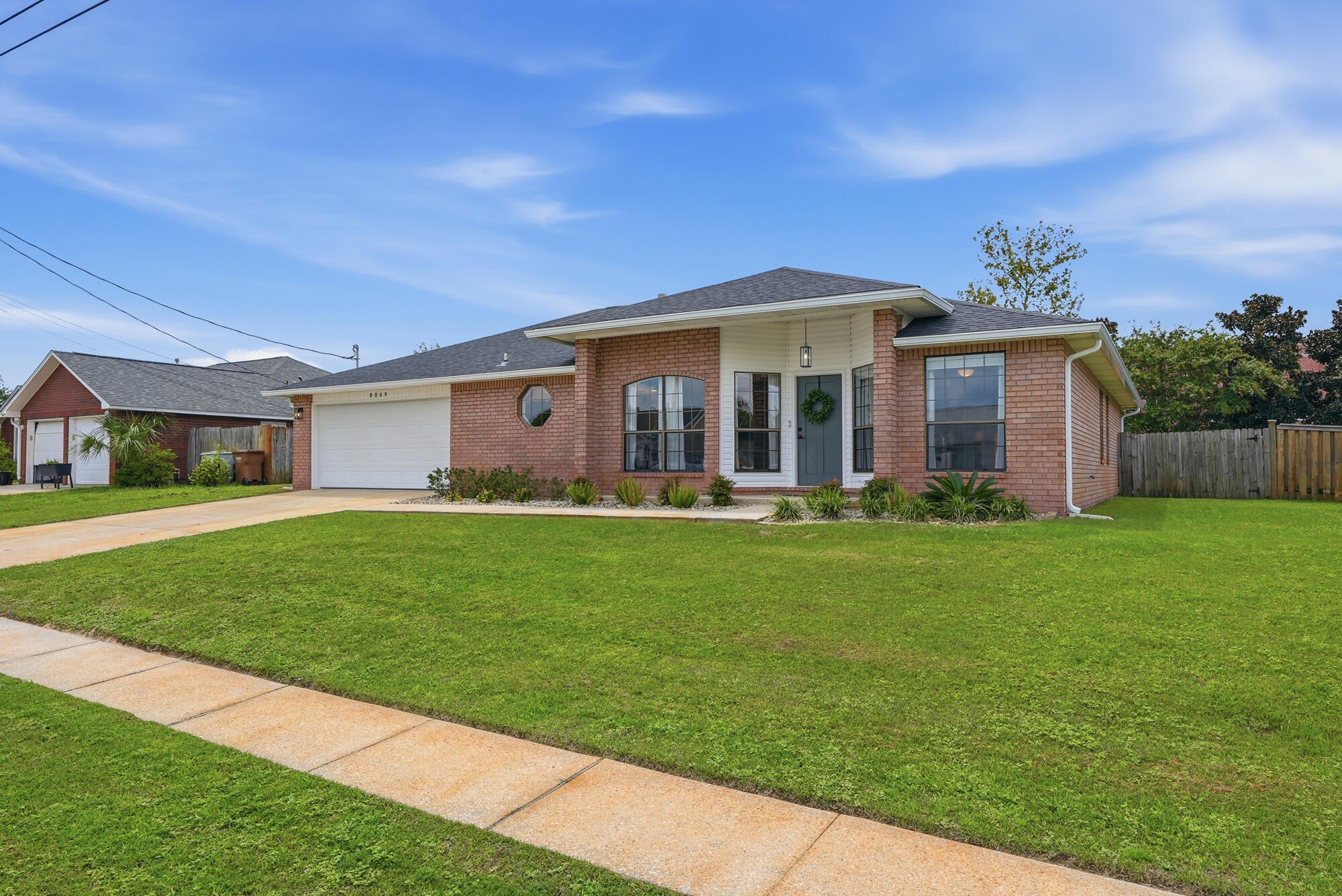 🌊ASSUMABLE VA LOAN 4.875%
 It doesn't take a crystal ball to see that this home is a perfect choice to be close to the beach while also enjoying stunning finishes and updates! 2021 ROOF!
Welcome to 8869 Cagle Dr in desirable Navarre, Florida, your low-maintenance coastal retreat where the sugar-white sands are a short hop away and everyday conveniences (including shopping) are truly walkable.
Enjoy complete freedom with no HOA, plus over $41,700 in recent upgrades that make this home move-in ready and worry-free:
•  Popcorn ceiling removal
•  Brand-new HVAC 
•  Updated sprinkler system with new K-Rain controller
•  Pest/termite bond
•  Hurricane shields
•  Fresh front landscaping with drip irrigation
•  Stainless steel dishwasher
•  New light fixtures & ceiling fans
•  6-inch white seamless gutters
•  Full exterior + interior paint (garage, ceilings & walls)
•  Stylish updates throughout (cabinet hardware, blinds, ClosetMaid systems, door handles & more)
•  Brass tipping rail in the kitchen
•  Ecobee smart thermostat
• Spacious his-and-her walk-in closets in the primary suite, plus a secondary walk-in closet -- all blending seamlessly into the updated design for effortless organization and everyday convenience.
Beach living, walkable shopping, and thousands already invested in modern comforts -- all without the HOA restrictions. Don't miss this rare Navarre gem!