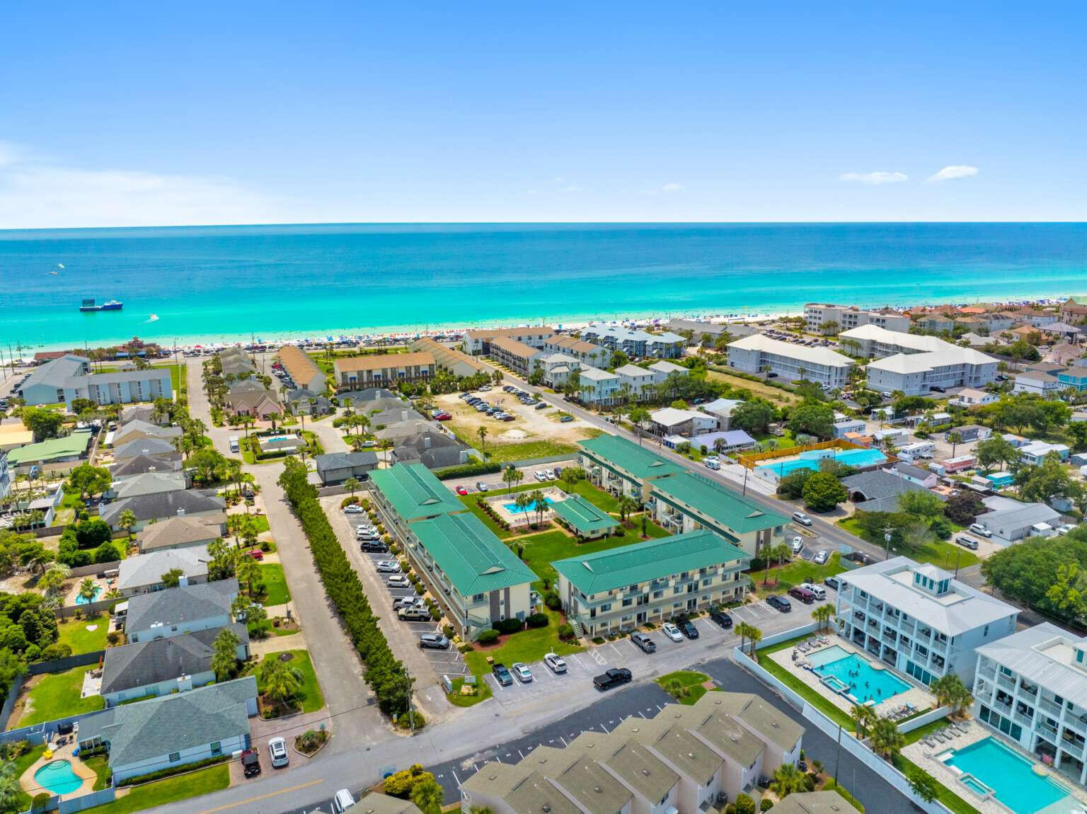 Turnkey Beachside Condo | STR-Permitted | Less Than 5-Min Walk to Gulf
Welcome to Flirty Flamingo -- a fully furnished, vacation-ready condo in the heart of Miramar Beach, less than a 5-minute walk to the sugar-white sands of the Emerald Coast. Whether you are seeking a personal beach retreat or a high-performing short-term rental investment, this property delivers both. This 650 sq ft ground-floor unit sits in a proven STR market with strong year-round demand from drive-to destinations across Texas, Tennessee, Alabama, and the broader Southeast. Short-term rentals are permitted in the community -- a significant advantage in a coastal market with increasing rental restrictions elsewhere.

The Unit Thoughtfully designed 1-bedroom, 1-bathroom condo sleeping up to 4 guests. The king-sized primary suite features a 12-inch memory foam mattress, 43" smart TV, and private en-suite bath access. A rollaway twin is stored in the closet and the living area sofa converts to an additional bed. New flooring, countertops, and stainless appliances throughout following a full renovation.

Location & Amenities 0.2 miles to Miramar Beach and Pompano Joe's -- less than 5-minute walk 30-second walk to community pool and BBQ area Ground floor -- no stairs, no elevator wait One dedicated parking spot directly at the front door Private patio with outdoor dining Full in-unit washer and dryer High-speed WiFi capable of 500 Mbps Fully stocked kitchen with coffee station Beach wagon, chairs, umbrella, and toys included

Investment Highlights STR-permitted community in a high-demand Emerald Coast market Fully furnished and guest-ready -- new owner can list and operate immediately All furnishings, linens, supplies, and beach gear convey with sale HOA: $370/month (covers exterior maintenance, pool, community grounds) Ground floor corner unit with dedicated parking -- consistently cited as top guest priorities in this market

Nearby Silver Sands Premium Outlets (2.6 mi), Destin Commons (2.8 mi), Whole Foods (2.6 mi), Henderson Beach State Park (4.1 mi), Destin Harbor (8 mi). Destin/Fort Walton Beach Airport (VPS) 35 minutes away.

A rare opportunity to own a fully operational, guest-ready beach condo in an STR-friendly community with zero ramp-up time. Everything a buyer needs to begin hosting is already in place.