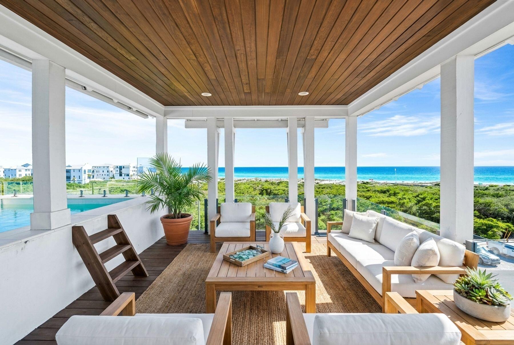 This exceptional four-level custom home in the Mala Beach community offers FOREVER Gulf views and a standard of construction rarely seen along the Emerald Coast.
Spanning 5,204 square feet, the home features an elevator servicing all levels. It includes four spacious king primary suites and two bunk bedrooms. The entryway leads the experience with a soaring Venetian plaster foyer and raised ceilings that lead into a large open living area with Peacock paver floors and floor-to-ceiling Jeldwen windows. A king bedroom features dual vanities and curated marble countertops. A marble wet bar with sink and refrigerator, powder bath, laundry, and an attached garage currently outfitted as a game room complete this level.
The second floor houses one king primary suite with a stunning marble bathroom featuring a freestanding soaking tub, rainhead shower, and floating vanities. Additionally, there are two generously sized bunk bedrooms each with a dedicated bathroom featuring a large walk-in shower.  The bunk bedrooms accommodate ten guests across three single bunks and one full-sized bunk per room which is the perfect spot for the kids to hang out. 
The third floor provides two additional king primary suites, both with direct access to a balcony that offers breathtaking Gulf views. The large ensuite baths are equally impressive, featuring freestanding tubs, marble tile floors and showers, and floating dual vanities. A second laundry is also located on this level. The fourth floor of this residence offers unparalleled Gulf views from every angle. A dramatic vaulted ceiling seamlessly integrates the living, dining, and kitchen spaces. The chef's kitchen stands as a culinary masterpiece, featuring a handcrafted La Cornue range, a paneled SubZero refrigerator, Italian-made cabinetry, and honed marble countertops, complemented by a stunning full-wall backsplash. The powder bath is accentuated by a sculptural pedestal sink and handcrafted full tile wall. Euro Wall sliding doors provide access to the rooftop deck, which includes a heated pool that you will never want to leave with majestic Gulf views. The home boasts over 800 square feet of outdoor living space for year-round enjoyment.

This remarkable retreat is a must-see for the discerning buyer seeking the ultimate blend of serenity, style, and coastal charm. The absence of development in front of the property ensures that the Gulf views will be endlessly cherished.  Conveniently located just steps from one of Walton County's premier beach accesses and minutes away from Alys Beach, Rosemary Beach, 30Avenue, and the vibrant shopping and dining options that the Emerald Coast offers.
