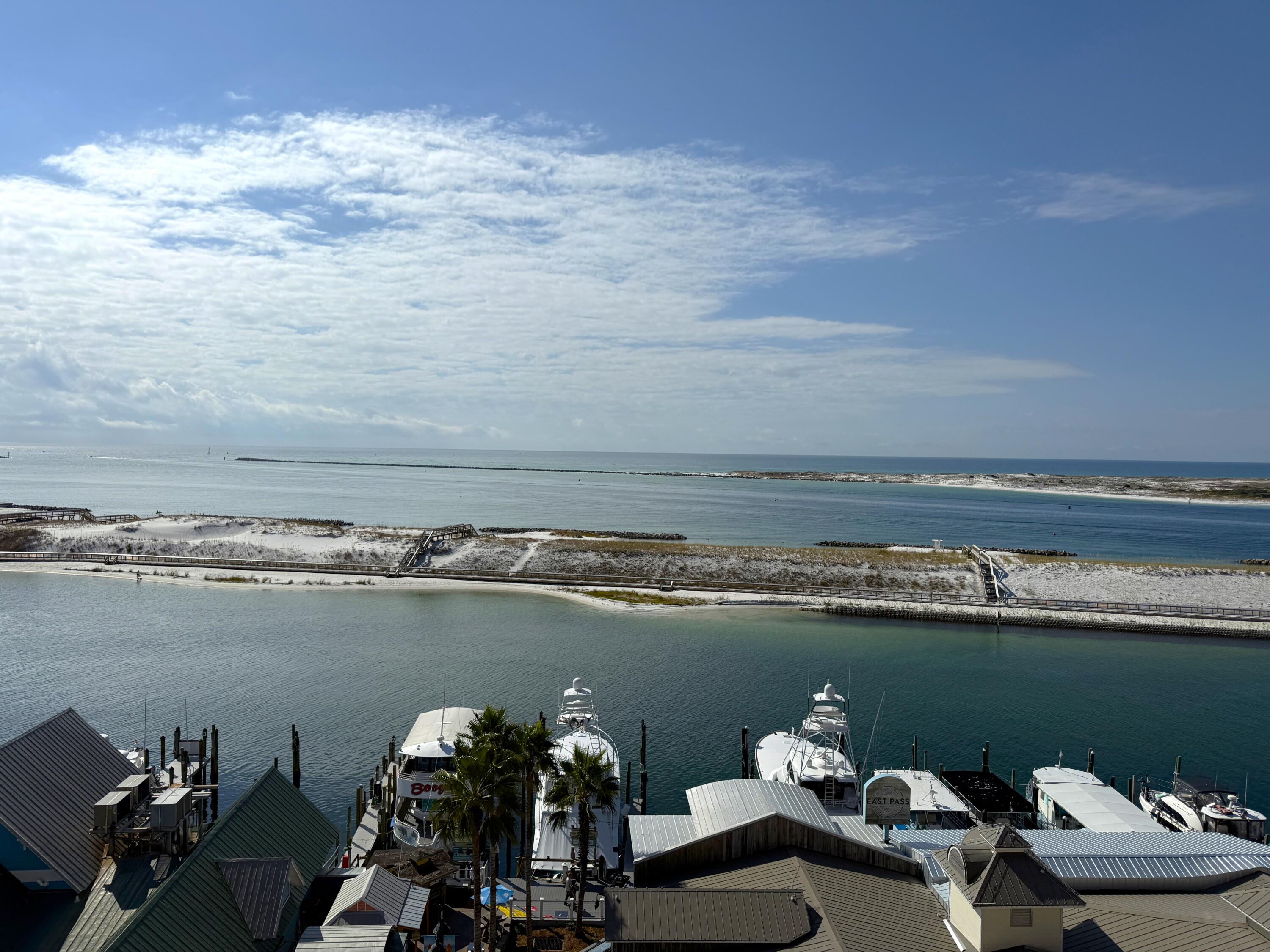 Fractional Ownership! Share B for Sale. Discover the perfect blend of luxury and convenience with this exceptional fractional ownership opportunity! This stunning 4-bedroom, 4-bathroom condo boasts a spacious open floor plan and over 500 square feet of balcony space, offering sweeping panoramic views of Destin Harbor, East Pass, and the Gulf of Mexico. Each bedroom includes a private bathroom, providing comfort and privacy for you and up to 10 guests. Fractional ownership allows you to enjoy the benefits of a vacation home without the year-round upkeep. Take advantage of the premier amenities at Emerald Grande at HarborWalk Village, including pools, a fitness center, a spa, and more.