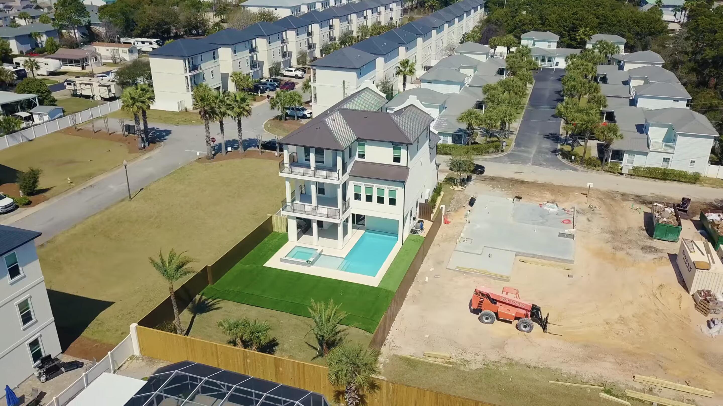 Discover a stunning newly-built retreat just minutes from the Gulf's white sands. Spanning over 3,700 sq ft across three levels, this 8-bed 7-bath  home features multiple living areas, a two-car garage, and a resort-style pool. Enjoy a chef's kitchen, wet bar, spacious outdoor living areas. Designed for entertaining and comfort, it's ideal as a luxury getaway or investment with strong rental potential (projections over 250K!)