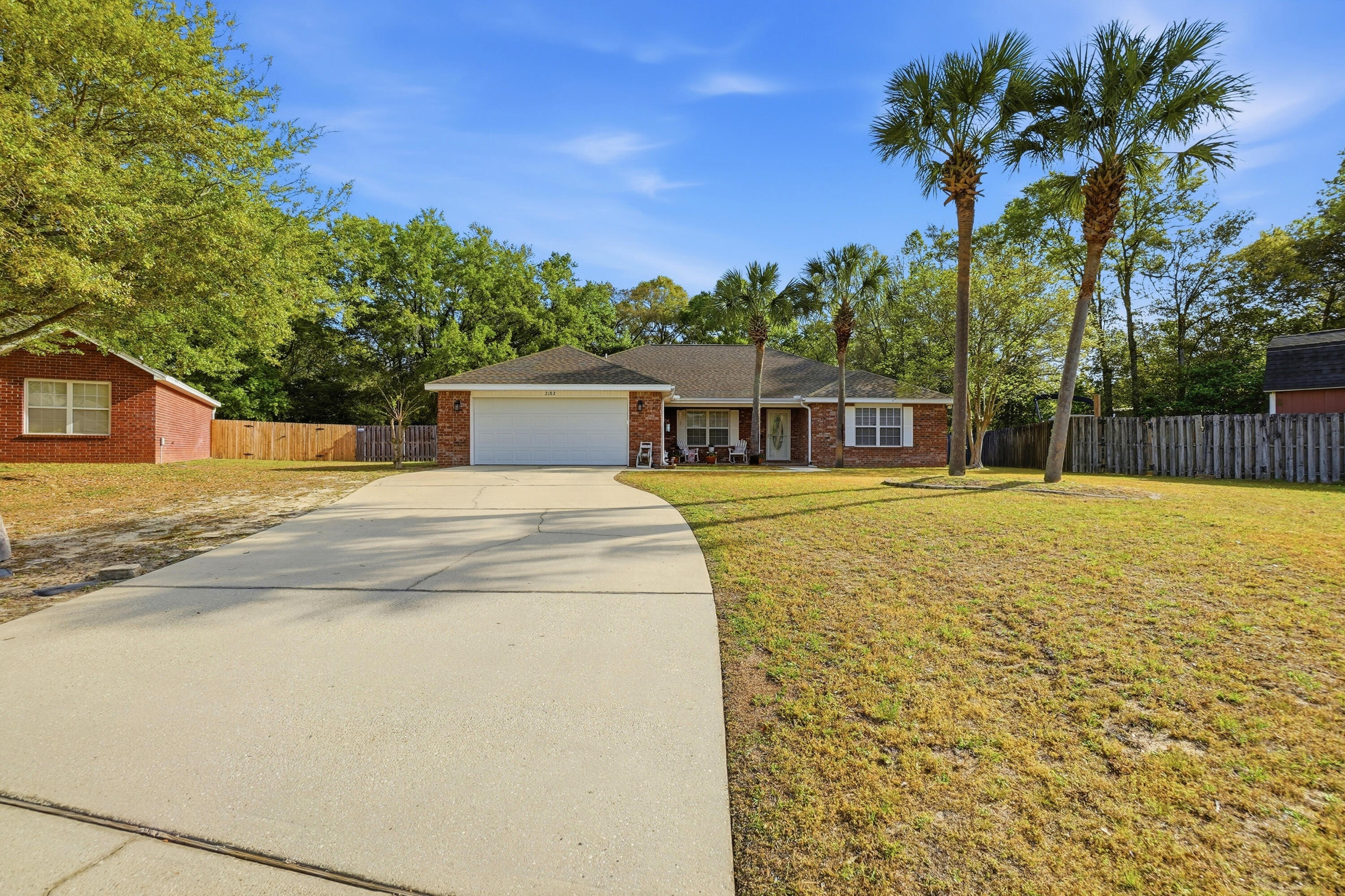 Back on the market - Previous buyer's bad luck could be your good fortune!  Pristine One-Owner Brick Beauty on Private Lot -- Low County Taxes!
Welcome home to this immaculately maintained, one-owner brick masterpiece nestled on a large, private lot in the quiet loop of a sought-after neighborhood. From the moment you arrive, the pride of ownership is undeniable -- clean as a whistle and built to last, this 4-bedroom plus office (easily a 5th bedroom) 2-bath gem is truly a rare find.
Step inside and be wowed by soaring 10-foot ceilings in the great room, where elegance meets comfort. The thoughtfully designed split floor plan offers privacy and functionality, while the tray ceiling adds a touch of sophistication to the living space. The chef of the family will love the kitchen featuring a breakfast bar and gleaming stainless steel appliances -- perfect for entertaining or everyday living.
Retreat to the spacious master suite, complete with a luxurious garden tub, separate shower, and room to truly unwind. The entertainment possibilities are endless -- the living room, master bedroom, master bath, and outdoor patio are all pre-wired for surround sound, making movie nights and gatherings an absolute pleasure.
Outside, swaying palm trees and a full sprinkler system frame your generous lot -- with plenty of room to add the pool of your dreams. Whether you're relaxing on the patio or enjoying the natural privacy this setting provides, you'll never want to leave.
All of this, plus the bonus of low county taxes. Homes like this don't come along often -- well built, even better kept, and ready for its next lucky owner.  Brand new roof installed July 2026.
Schedule your showing today before it's gone!