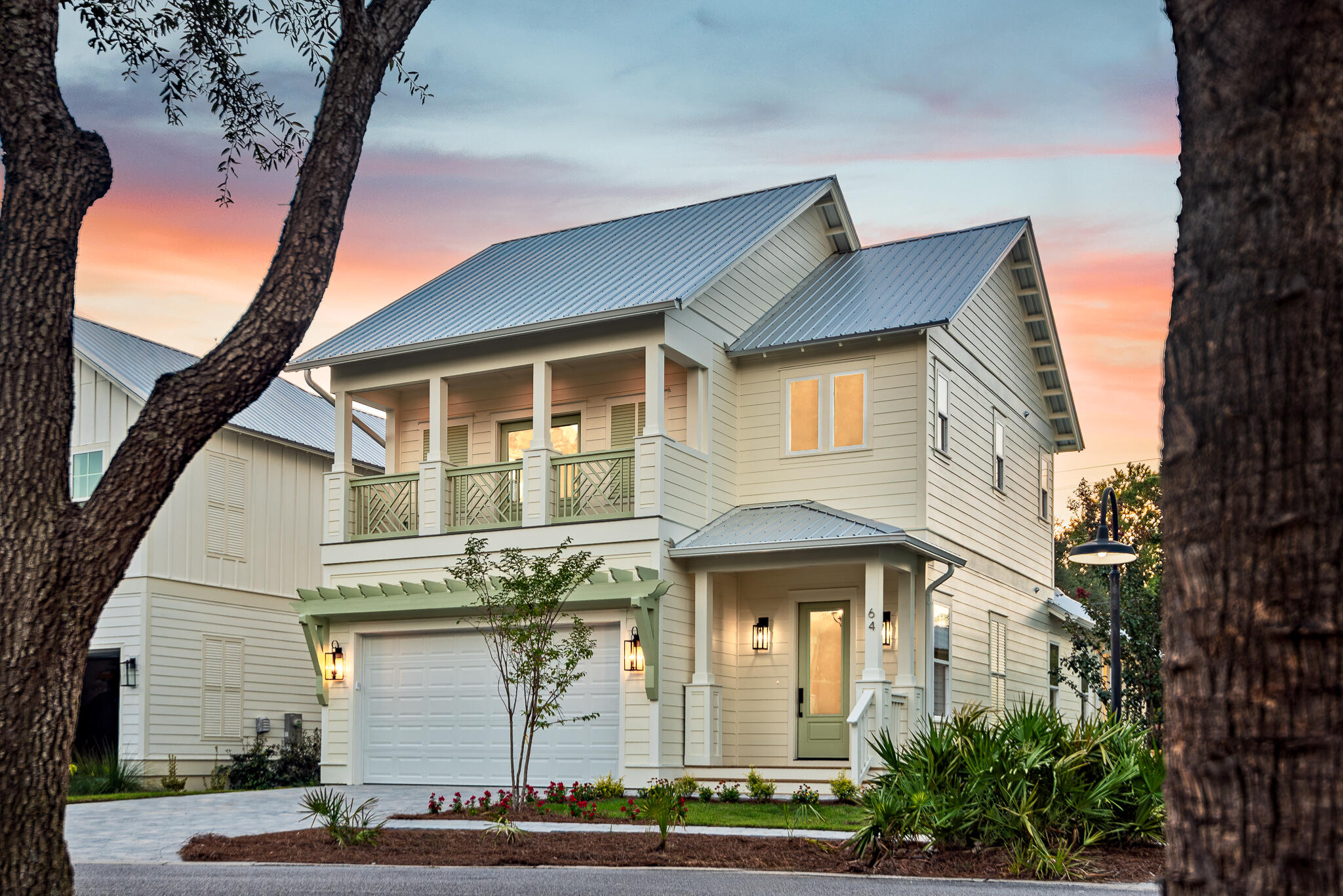 NEW Construction! Must see 4bd/3.5ba home in gated Hidden Grove, in Santa Rosa Beach, FL close to the Bay. The primary bedroom/bath are on the ground floor.  There is a junior suite with en-suite bath, and two guest rooms upstairs that share a large hallbath, and a bonus area for TV/or office.  All three full sized bathrooms have double sinks. Enjoy the open concept living/dining/kitchen. Many upgraded features: luxury vinyl plank flooring, plumbing, and lighting fixtures.  Forget about pesky mosquitos because you  will have a covered, screened-in backporch  to enjoy our Florida weather.  Home has impact rated windows and doors, siding is Hardi-board (concrete siding), plus a metal roof.  Not only are there 4 bedrooms (primary on main floor) but also a two-car attached garage, with an epoxy flex-finish floor.  There is a nice powder room for your guest on the main level.  Inside the backdoor from the garage, you have a full-sized walk-in laundry room, and a large walk-in pantry.  AND......a second refrigerator with options for useage: half refrig and half freezer, or all freezer, or all refrigerator.  Who wouldn't love to have a second refrig. inside the house. You will be impressed with the well thoughtout space planning. There is a large community pool, 2 lots to the west.  Small subdivision of only 75 homes.  Great family community.  Close to 30A, Sacred Heart and Grand Blvd.  Flood zone X, no flood ins. required.  Some photos show virtual staging for ideas only.