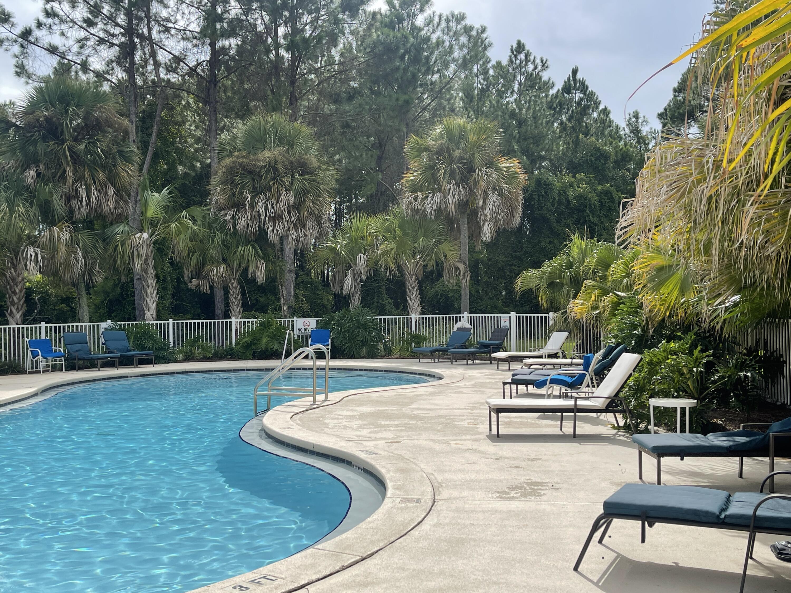 Discover comfortable, maintenance-free living in this beautifully furnished 1-bedroom, 1-bathroom condominium located in the highly sought-after Florida Club community. Situated on the second floor with convenient elevator access, this spacious condo offers the perfect combination of comfort, style, and an unbeatable location just minutes from military bases, sugar-white beaches, shopping, dining, and entertainment.

Step inside to a bright and inviting interior featuring tasteful furnishings, neutral paint, and elegant tile flooring throughout the main living areas. The fully equipped kitchen boasts granite countertops and ample cabinet and counter space. Adjacent to the kitchen is a dedicated dining area that flows seamlessly into the spacious living room, creating an open and welcoming space for relaxing or entertaining. A full-size washer and dryer are also included in the laundry room off of the kitchen  for your convenience.

The generously sized bedroom has been updated with beautiful new flooring, offering a completely carpet-free retreat complete with a comfortable memory foam mattress for restful nights. Step outside onto your private screened-in balcony overlooking a peaceful wooded setting, the perfect place to enjoy your morning coffee or unwind after a long day. The balcony also includes a locking storage closet, providing additional storage space.

 Residents of the Florida Club enjoy access to outstanding community amenities, including a resort-style swimming pool, hot tub and spa, 24-hour fitness center, business center, picnic areas, and outdoor grilling stations, making it easy to enjoy both relaxation and recreation right outside your door.

Pets may be considered on a case-by-case basis with prior owner approval and a non-refundable pet fee. This is a smoke-free property, including vaping.

If you're looking for a move-in-ready home that offers comfort, convenience, and exceptional community amenities in a prime location, this Florida Club condominium is the perfect place to call home.