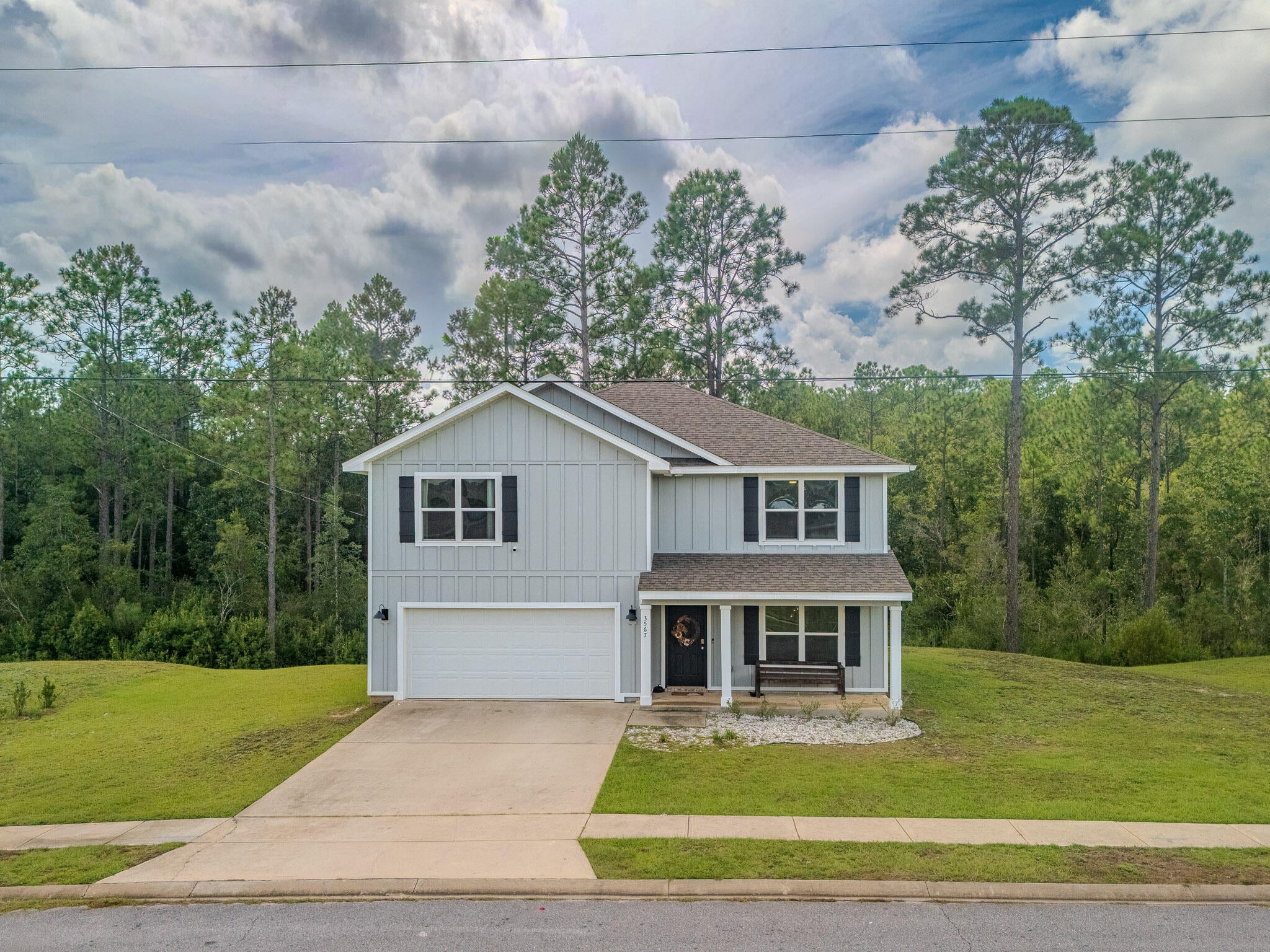 Welcome to this spacious Hayden floor plan in fast-growing North Crestview! This 5-bedroom, 3-full-bath, two-story home offers a kind of flexible space that makes everyday life a little easier-and gives everyone a place to spread out. The open-concept main living area is made for gathering, while the upstairs loft provides a second living space, game room, homework zone, or whatever your household currently needs (because apparently one living room is never enough). 

The kitchen features a large island with bar seating, stainless steel appliances, a smooth-top range, built in microwave, quiet dishwasher, generous pantry, and adjoining dining area. A bedroom and full bath are conveniently located downstairs, perfect for guests, a home office, or anyone who would prefer to skip the stairs. Upstairs, the primary suite offers a spacious bedroom, double vanity, large walk-in shower, and roomy walk-in closet. Additional bedrooms are generously sized and feature engineered vinyl plank flooring and Frieze carpet. Smart home features, including keyless entry, add everyday convenience. 

With its functional layout, abundant living space, modern finishes, and convenient North Crestview location, this home is ready for its next chapter- preferably with people who appreciate a good floor plan and don't mind fighting over who gets the loft.