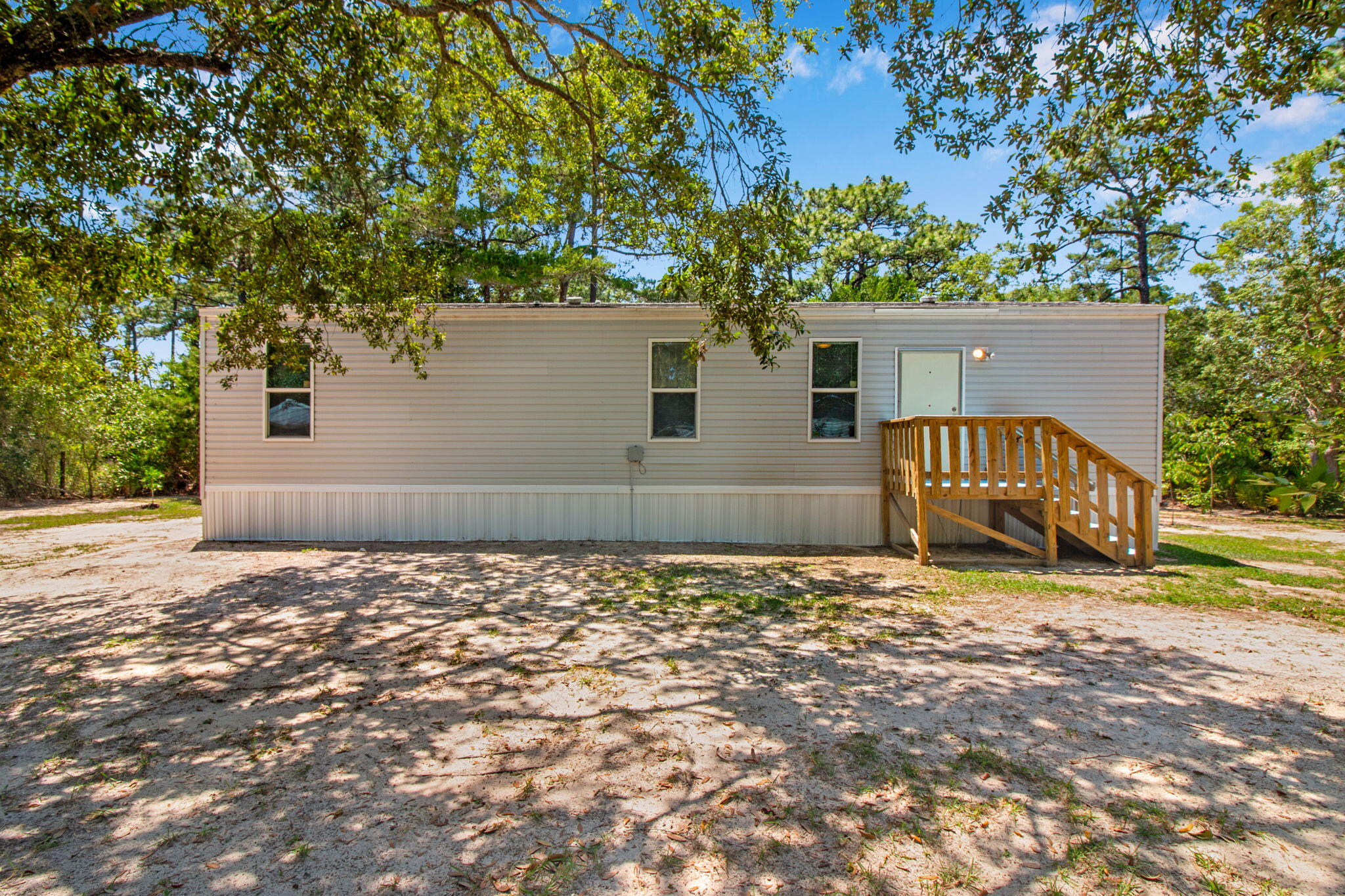 $250 OFF First Full Month's Rent!

Located in Peachtree Farm, this well-maintained 2BD/1BA manufactured home offers the opportunity to enjoy the Emerald Coast lifestyle. Conveniently situated near local shopping, dining, entertainment, and the world-famous white sand beaches of 30A and the Gulf Coast, the property combines comfort, convenience, and value in one of Northwest Floridas most sought-after coastal communities. Nearby listings in Peachtree Farms highlight the areas proximity to beaches, boat ramps, schools, and retail centers.

The home features an open layout with easy-to-maintain flooring throughout and no carpet, creating a clean and low-maintenance living environment. Included washer and dryer appliances add everyday convenience, while the additional storage unit provides extra space for tools, beach gear, or seasonal items.

Tenant pays all utilities. Holding fee is due within 24hrs of approval. Lease must start within 14 days of payment. Lease Prep Fee of $75 is due prior to move in. Approved pets require $400 pet fee per pet. Renters insurance is required. Property is available for a 12-month lease.