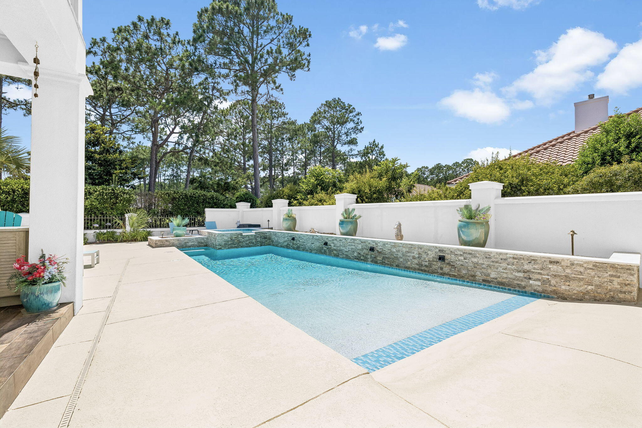 ** PRICED TO SELL** PRICED BELOW COMPARABLE VALUE** POOL & HOT TUB** NATUREKAST OUTDOOR KITCHEN** GOLF COURSE VIEWS** SELLER OWNS 2 HOMES AND WANTS THIS SOLD....! Life inside the Sandestin Resort gates moves differently, and this beautiful residence on the 16th hole of Raven Golf Course puts you right at the center of it. Overlooking one of the Emerald Coast's most celebrated fairways, this home blends resort-caliber upgrades with the laid-back luxury Sandestin owners know well. Barefoot mornings start on fresh hardwood floors, newly laid through every upstairs bedroom and stairwell. Both upstairs bathrooms have been renovated, the kind of update you feel the moment you step in. Outside, the Naturekast summer kitchen is where evenings happen: grilling with a gulf breeze, drinks in hand, no reason to go anywhere. The saltwater pool and hot tub have been completely reimagined (2023) - PebbleTec finish, new tile, new heater, new pump, the only thing left to do is get in. A golf cart garage with custom built-ins keeps everything organized, and a flexible bonus room downstairs adapts to whatever your life needs most.