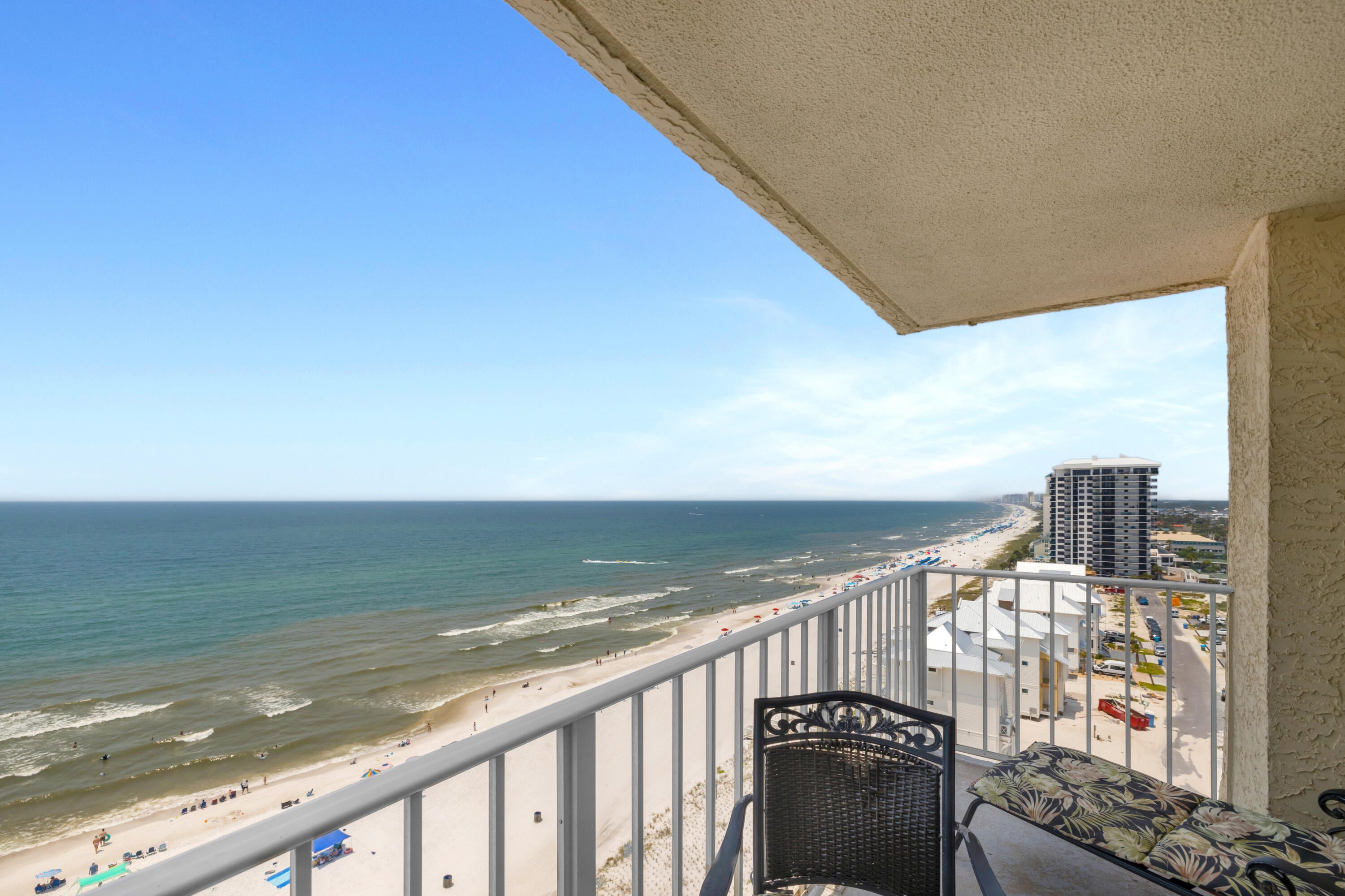 HIGH FLOOR. CORNER UNIT. UNOBSTRUCTED COASTLINE VIEWS. Regency Towers 1305 is a one-bedroom, one-and-a-half-bathroom Gulf-Front condominium in Panama City Beach, Florida, offering westward views across the white-sand beaches and coastline of PCB. The corner layout places the view at the center of the experience, with an additional coastline-facing window in the living room, a Gulf-facing sliding glass door leading to the balcony, and separate balcony access from the bedroom. Wake up to views extending down the coastline directly from the bed. The bedroom includes an en-suite full bathroom, while the additional half bathroom includes a stackable washer and dryer. The interior is ready for renovation, creating an opportunity to acquire one of the building's most distinctive high-floor vantage points and remodel the unit according to your preferred style. The flooring can be replaced. The furniture can be replaced. But this view cannot be replaced the HVAC is from 2015 and the water heater is from 2019. Regency Towers has been a Panama City Beach destination for more than 40 years. Located in the South Lagoon area, this gated beachfront community is near St. Andrews State Park, area attractions, and dining options including Captain Jack's, Schooners, and Patches Pub. Community amenities include 24-hour security, on-site parking, two beachfront pools with one seasonally heated, a wading pool, indoor hot tub, owners' lounge, fitness center, game room, picnic and grilling area,  private beach access by boardwalk and The Sandbar, a recently remodeled on-site dining option currently open daily from 11 AM to 6 PM. Additional Panama City Beach attractions include Dolly Parton's Pirates Voyage Dinner & Show, Topgolf, McGuire's Irish Pub, and Tootsie's Orchid Lounge. HOA dues are currently $2,546.30 per quarter and include water, sewer, trash service, pest control, and access to community amenities. HVAC: 2015. Water heater: 2019. Pets are not permitted under current association rules. Assistance animals are governed by applicable law and association procedures. All information is deemed reliable but not guaranteed; buyer to verify if important.