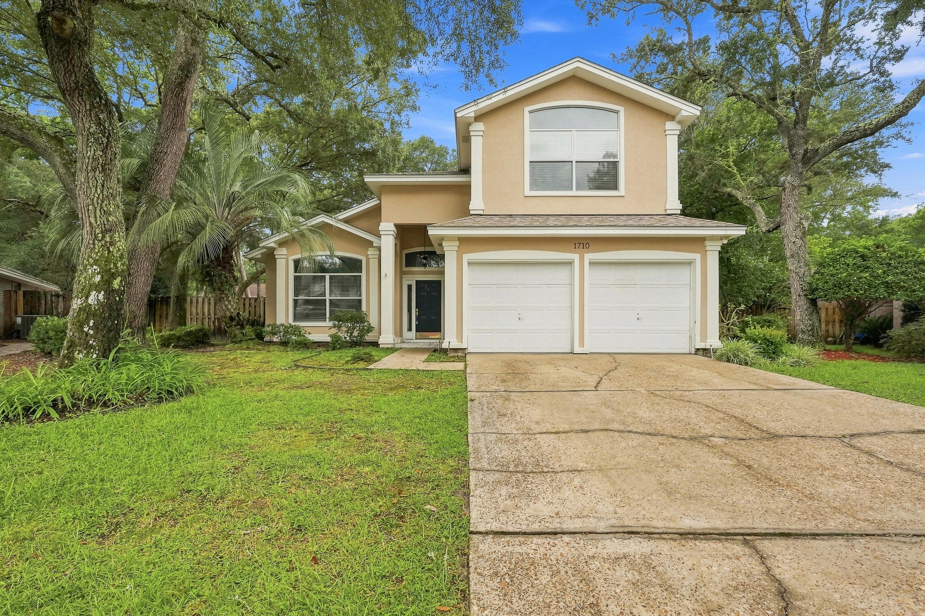 Located in the desirable gated community of Parkwood Estates in Bluewater Bay, this spacious two-story home offers a comfortable floor plan filled with natural light and plenty of windows throughout.

The main level features multiple living spaces, including a welcoming living room , a formal dining room with built-in shelves, and a dedicated office space. The kitchen is designed for both everyday living and entertaining, featuring oak flooring, granite countertops, a walk-in pantry, a large eat-in area, and a charming corner window.

Upstairs, you'll find private bedroom accommodations, creating a peaceful retreat away from the main living areas. The family room offers additional space to relax and features durable tile flooring.

Outside, enjoy a fully fenced backyard perfect for gatherings or quiet evenings, along with a two-car garage. This Bluewater Bay home combines comfort, functionality, and a sought-after community lifestyle. Contact us today for a showing! Pets considered with application.