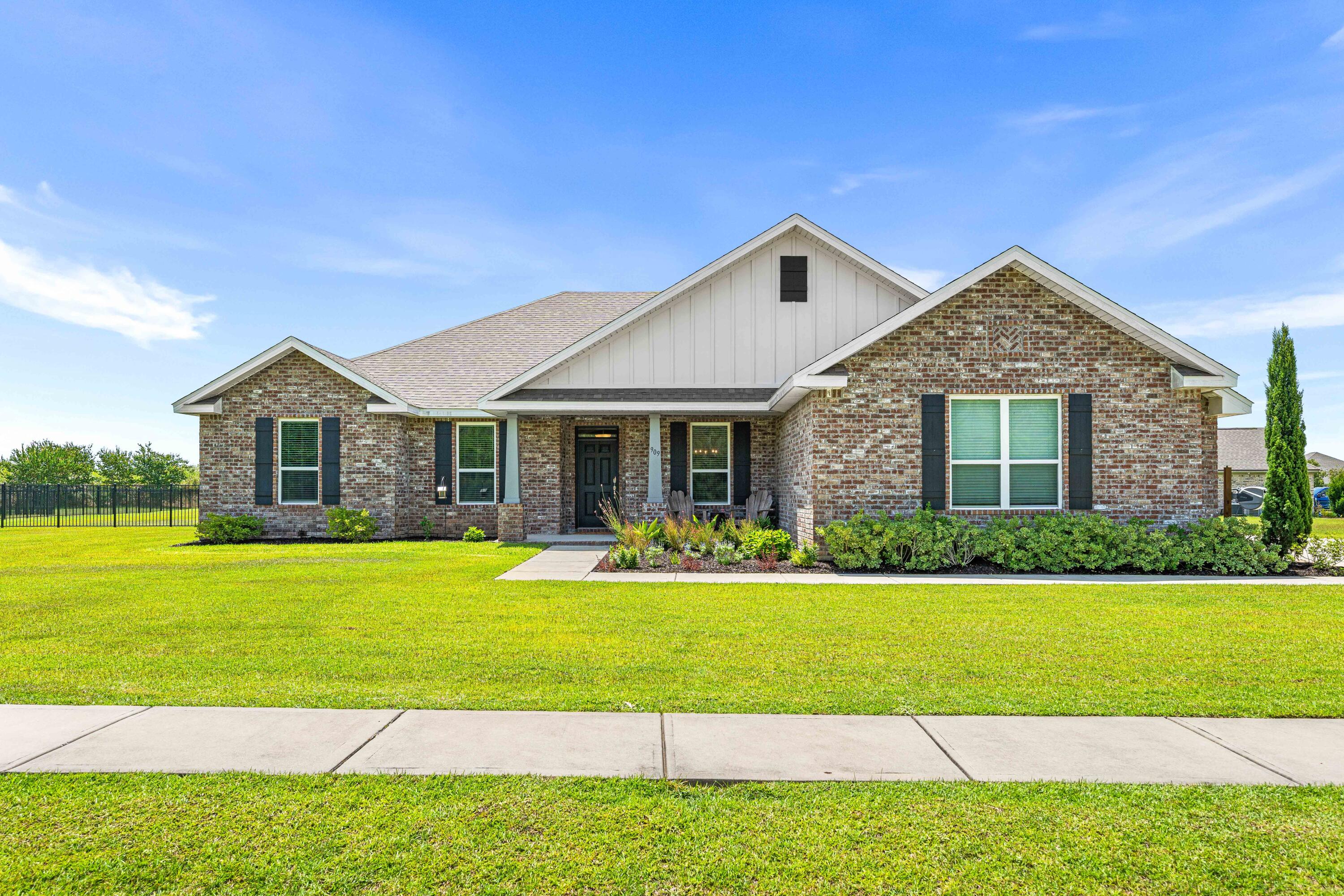 Golf Course Living at Its Finest -- 4BR/3BA on the Green in Windswept Estates. Wake up to sweeping fairway views in one of Freeport's most sought-after addresses. This 4-bedroom, 3-bath home offers roughly 2,500 square feet of thoughtfully designed living space, an attached garage, and a fully fenced backyard that backs directly up to the green at Windswept Dunes Golf Club. Grab your coffee, step onto the back porch, and watch the morning roll by while the kids play in the yard -- this is the lot golfers dream about. Step inside and the details speak for themselves. Premium LVP flooring runs
throughout, high ceilings and big windows fill the home with natural light, and quartz countertops bring a clean, modern finish to the heart of the home. The owner's suite is a true retreat, featuring a cozy electric fireplace, a tiled walk-in shower, a large soaking tub made for unwinding, and a spacious master closet with room for everything. Out back, a generously sized porch gives you the perfect spot to relax and take in the view while the little ones run and play. You're not just buying a home -- you're buying a lifestyle. Windswept Estates is a premier, gated golf course community, and the Windswept Dunes Golf Club anchors it with an 18-hole, Par 72 championship course, a clubhouse, a large swimming pool, tennis and basketball courts, and a children's playground. Homes on the green don't last. Come check it out!