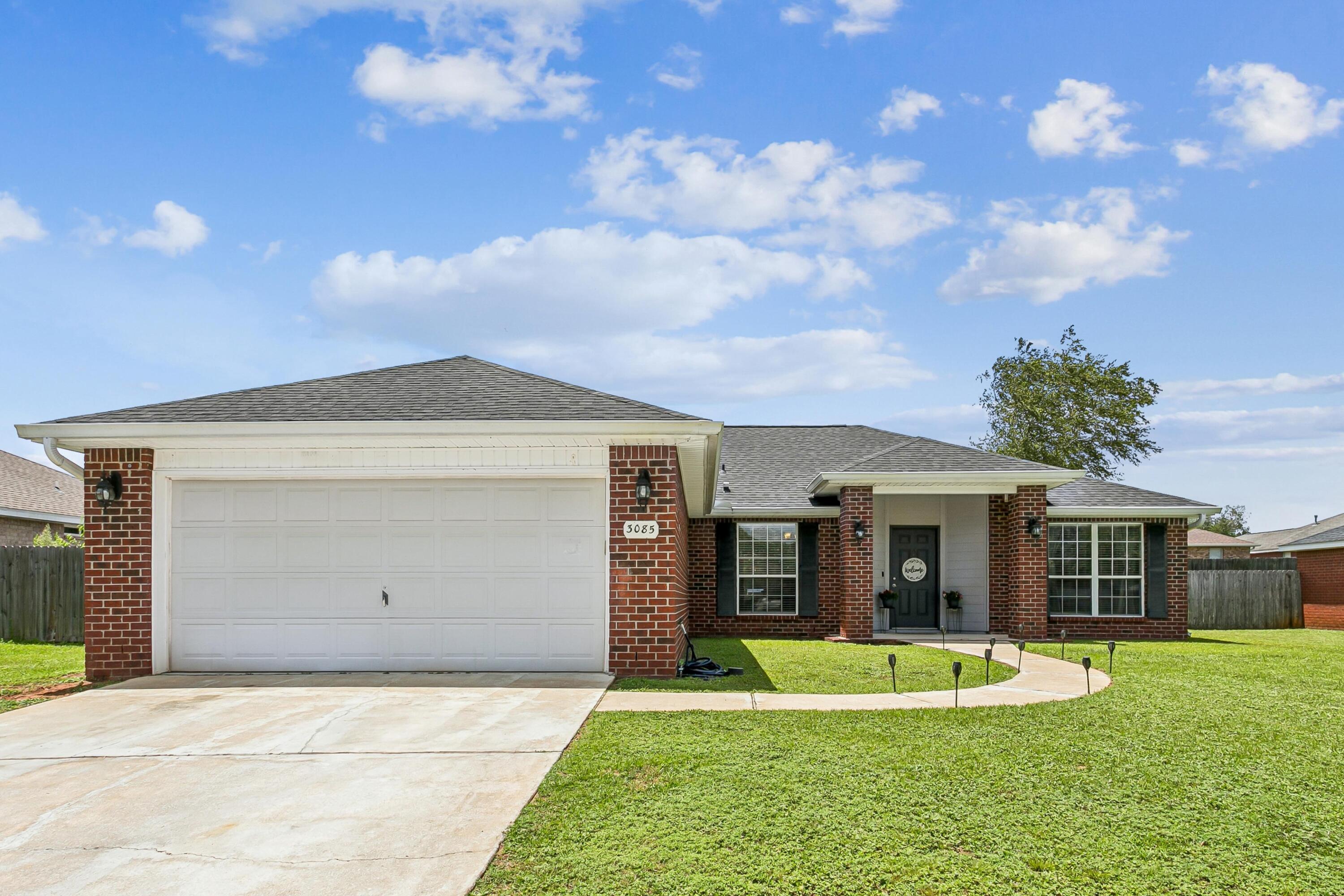 Come see what makes this Brooke Estates home special! This 4-bedroom, 2-bath property offers a spacious layout designed for both comfort and entertaining. Vaulted ceilings add to the open feel of the home, while the generous living room and separate dining area provide plenty of room to relax, gather, and enjoy everyday life. A cozy fireplace adds a welcoming touch to the living space.
The kitchen offers granite countertops, upgraded lighting, a raised breakfast bar, and plenty of cabinet and counter space. The split-bedroom floor plan provides added privacy, with a spacious primary suite featuring a double vanity, garden tub, separate shower, and walk-in closet.
Additional features include three generously sized guest bedrooms, a full guest bathroom, a large laundry room, and a two-car garage. 
Enjoy the neighborhood amenities, including a community pool and tennis courts. Conveniently located in the heart of North Crestview, this home is just minutes from schools, shopping, restaurants, the library, downtown Crestview, I-10, and an easy commute to Eglin Air Force Base, Duke Field, and other area military bases.
Don't miss this wonderful opportunity to own a move-in-ready home in one of Crestview's most desirable neighborhoods. Schedule your showing today!