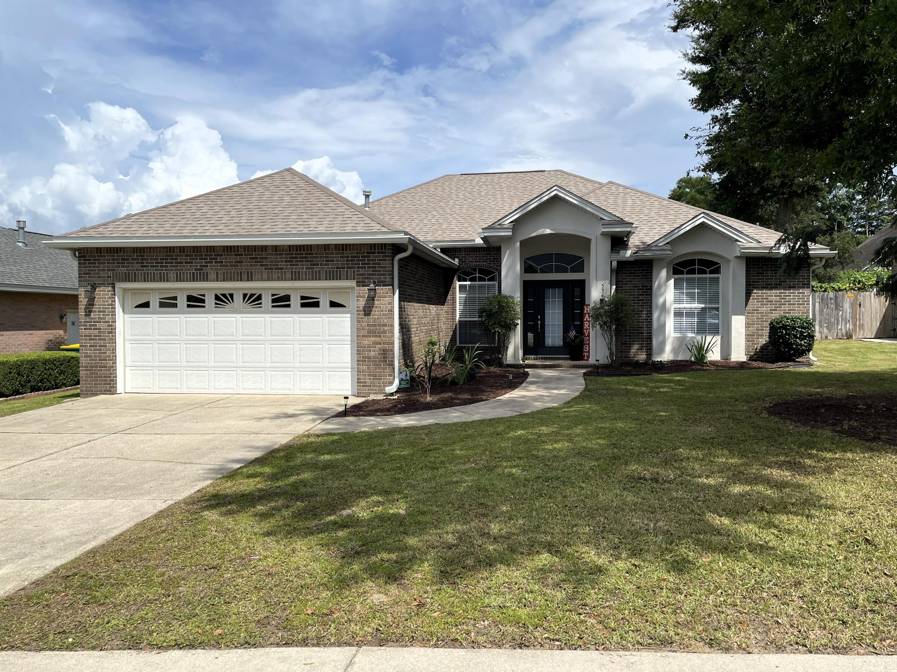 Welcome to this beautifully maintained home tucked away on a quiet, private cul-de-sac in the heart of Niceville, complete with sidewalks and convenient access to everything the area has to offer. Thoughtfully designed to make the most of every square foot, this home offers a spacious, comfortable layout with plenty of natural light throughout.

     A grand entrance welcomes you into the freshly painted great room, where soaring ceilings, abundant windows, and a beautiful ventless gas fireplace create a warm and inviting space. The kitchen features newly refaced cabinets, a new microwave and gas range, plus a pantry with plenty of storage. A large dining room provides the perfect setting for family meals and entertaining.

     French doors open to the screened-in porch, extending the living space outdoors and overlooking the spacious yard--ideal for kids, pets, play, or simply enjoying the peaceful surroundings. The spacious primary suite offers direct access to the screened porch, along with a large walk-in closet. The primary bath also features a convenient double vanity.

     The split-bedroom floorplan provides privacy, with two generously sized guest bedrooms that enjoy tons of natural light. An indoor laundry room adds everyday convenience, while the two-car garage provides plenty of space for vehicles, tools, and additional storage. Additional highlights include a sprinkler system and a roof that is only five years old. With its quiet cul-de-sac setting, functional floorplan, and thoughtful updates, this Niceville home offers the perfect blend of comfort, privacy, and convenience. Plus, it's only 15 minutes to Eglin AFB, 17 minutes to Duke Field, and 30 minutes to Hurlburt Field.