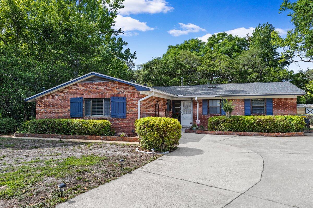 Back on the market due to buyer's circumstances--no fault of the seller or the property. This well-maintained home is ready for its next owner! Tucked away on a quiet cul-de-sac in Fort Walton Beach, this beautifully updated home sits on a lush, oversized lot with a fenced backyard, and mature landscaping. Inside, enjoy a fully renovated kitchen featuring quartz countertops, soft-close cabinetry, custom ash floating shelves, new appliances, and a large island--perfect for gathering. The flexible layout offers two living areas and three bedrooms privately situated opposite the main living space. Relax year-round with multiple outdoor living options including a covered patio, enclosed porch, and a spacious Florida room filled with natural light. Major updates include a new roof (2024), full electrical rewire (2024), new HVAC (2026), flooring upgrades, fresh paint, lighting, and more. This home blends comfort, style, and location.