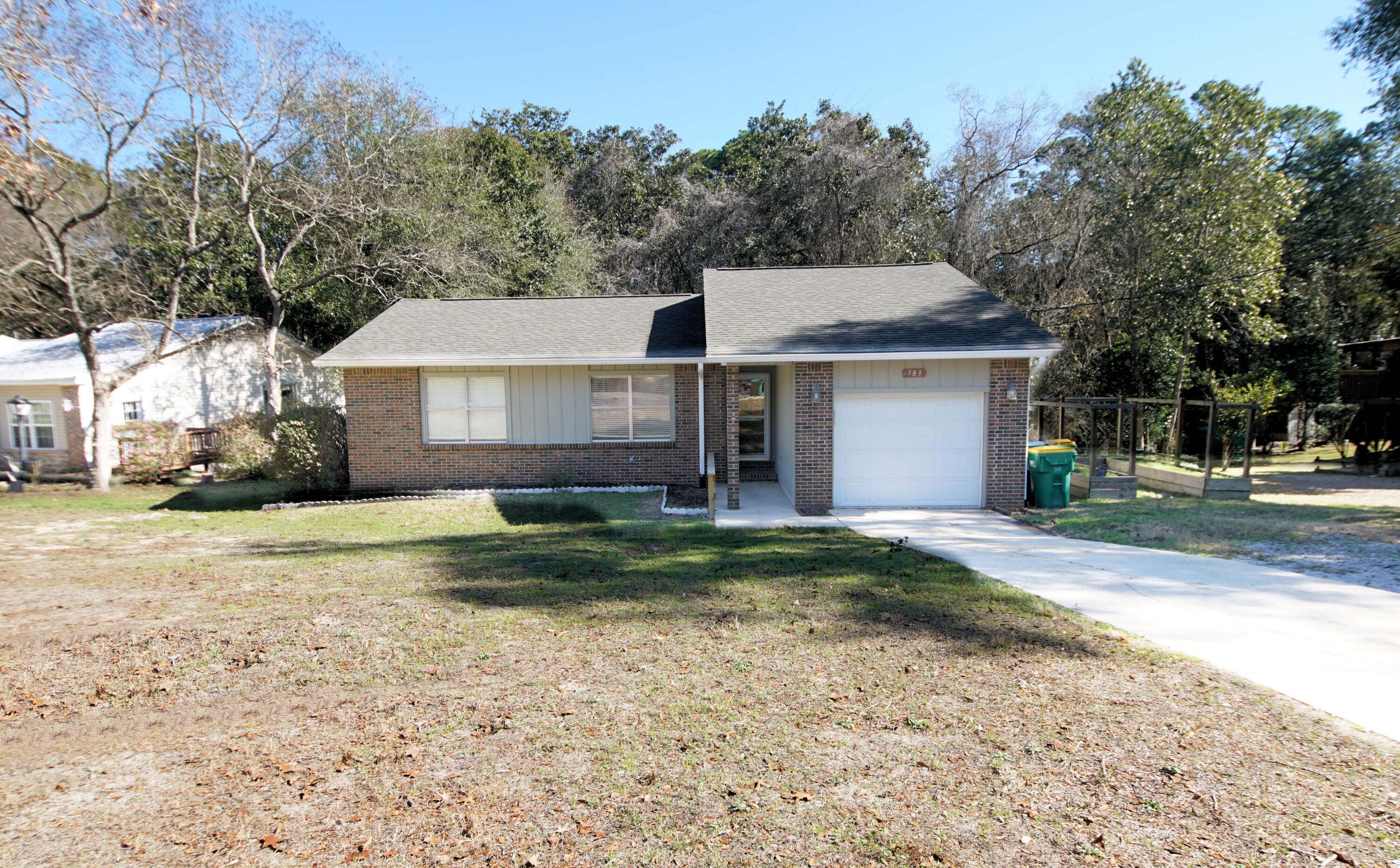 Located in the Creekside neighborhood of central Niceville, this well-maintained home offers a comfortable layout, great outdoor space, and a convenient location. The open living area flows easily into the dining room, with sliding glass doors leading to a  deck overlooking the backyard--perfect for relaxing or entertaining.
The kitchen is galley style with  ample cabinetry and stainless steel appliances. The spacious primary suite overlooks the backyard and includes a large walk-in closet and private update ensuite bathroom. Two additional bedrooms share an updated guest bathroom.
Vinyl plank flooring was installed in January 2024, and there is NO CARPET throughout the home. Outside, enjoy a large backyard that backs up to a peaceful greenbelt, a cul-de-sac location, and a one-car garage.
Conveniently located near Niceville High School, Ruckel Middle School, shopping, parks, and other area amenities, this home offers both comfort and convenience in a great Niceville location.
Roof: 2022. HVAC : Jan 2026