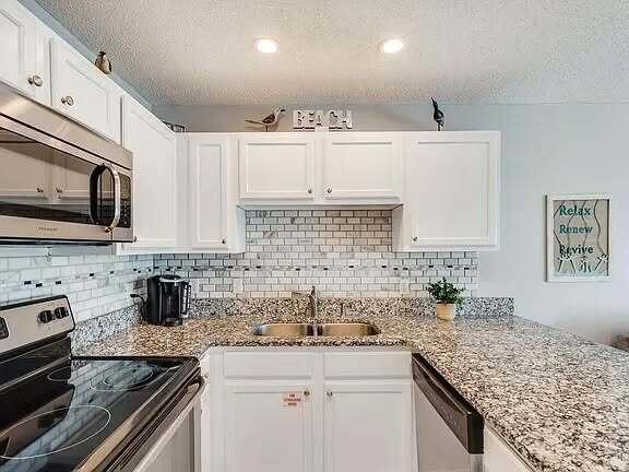 GRAND CARIBBEAN WEST CONDO - Residential