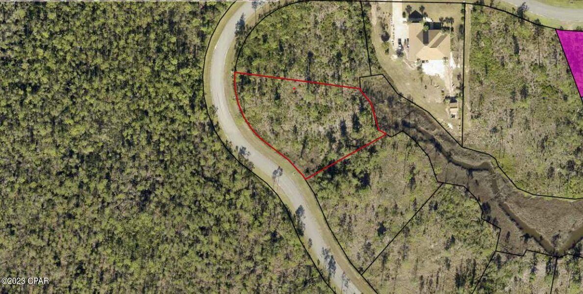 Check out this EPIC lot at a GREAT price! 
 Laird Bayou is a hidden GEM; come and experience the incredible beauty of the area. Build your dream home in this gated community and live just down the street from the boat dock and boat ramp to get to some of the best fishing and recreational boating in East Bay. Or relax at the community pool, complete with a bath house, and enjoy the peace and quiet of this area. Bring your RV and keep it in the boat/RV storage area. This magnificent lot is over 3/4 acre and awaits your dream home! Laird Bayou is comprised of site-built custom homes in the low-country/plantation style with flexibility in design. 2400 SF minimum homes with 1300 minimum SF for main floor on multi-level homes. Existing homes range from the high $400k's to over $1.2M