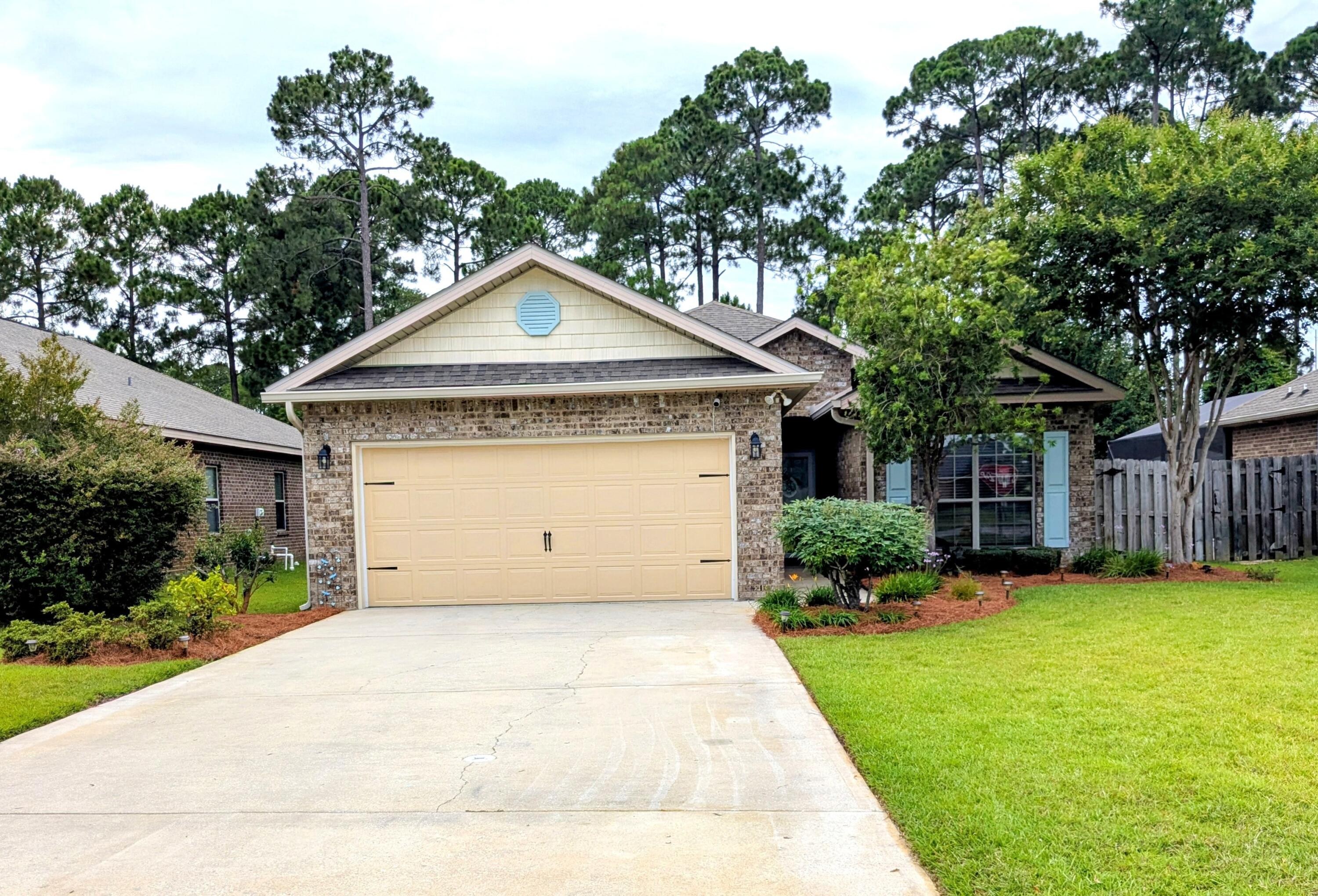 $5,000 IN SELLER CONCESSIONS FOR BUYERS TO USE ANY WAY THEY CHOOSE! Welcome to this beautifully maintained 4 bed, 2 bath home in Driftwood Estates in Santa Rosa Beach with a layout that just makes sense. Pond view on a low traffic street. Open living and kitchen area, granite countertops, stainless steel appliances, and high 9' ceilings throughout. The primary suite has wood floors and a trayed ceiling with beautiful crown molding, and it is tucked away from the other bedrooms for added privacy. The primary bath is complete with double vanities, soaking tub, separate shower, and a walk-in closet. The kitchen has stainless steel appliances, with new refrigerator and dishwasher, along with granite countertops. The backyard is fully fenced with preserve space to the rear and a large willow tree. The home features a full sprinkler system covering both the front and backyard, fed by a well to keep your water bill low and your yard looking good, with a Wi-Fi-enabled controller. Desirable neighborhood with a community pool, established landscaping, and low HOA fees. The nearby county park has a wonderful playground, tennis and pickleball courts, soccer fields, and a walking trail. Easy drive to schools, shopping, and the beach. Schedule your showing today! Buyer to verify all information during due diligence. The owner is a licensed Florida real estate broker.