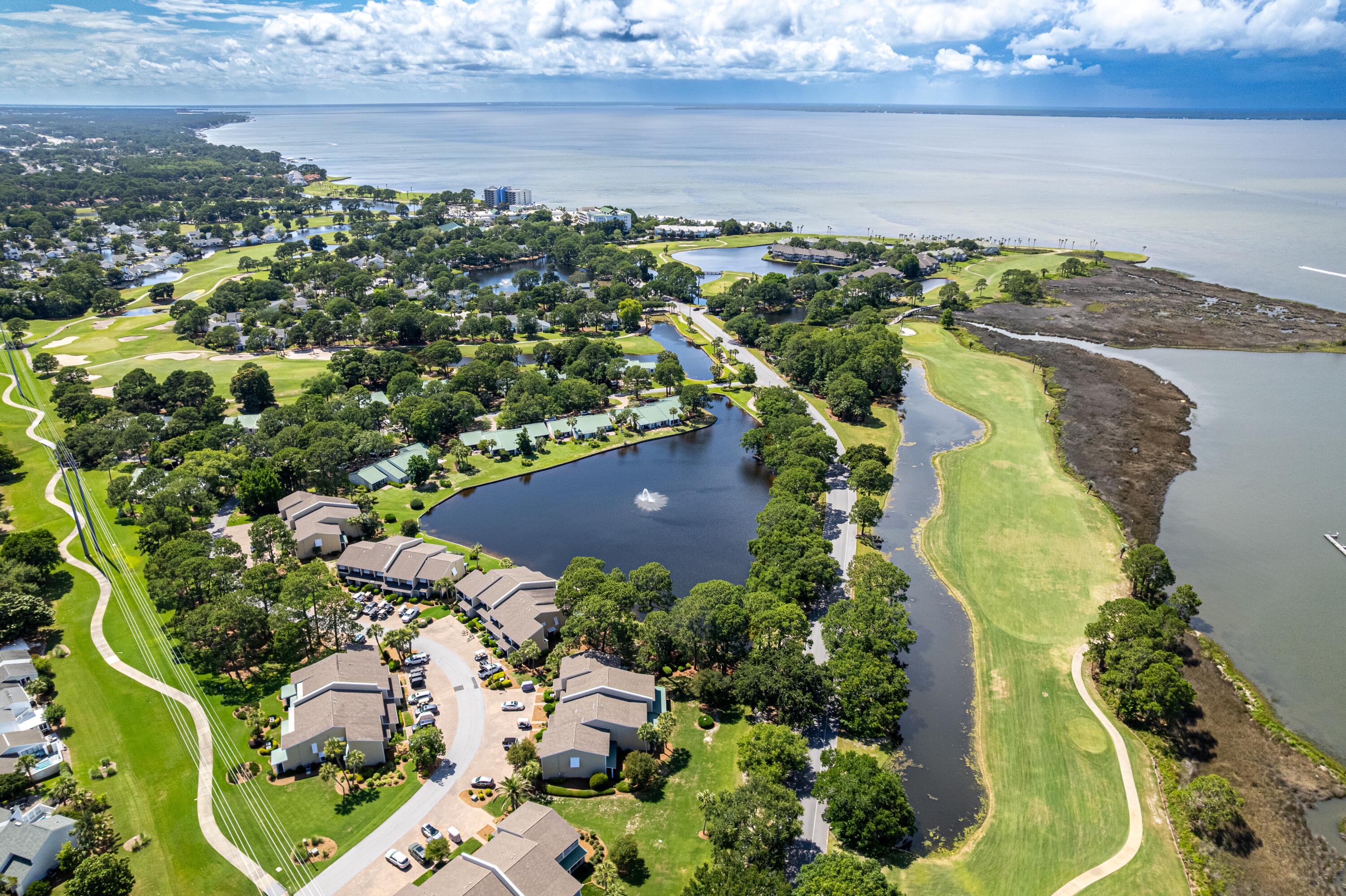 This fully furnished 2-bedroom, 3 full bath   lakefront townhome located in Bayou Village within Sandestin Golf & Beach Resort. This spacious townhome boasts 1640 sq. ft. and offers beautiful views of the lake from the screened-in patio. The Village of Baytowne Wharf is just a short drive away with fantastic dining, shopping, and entertainment options. NEW PHOTOS COMING JUNE 10