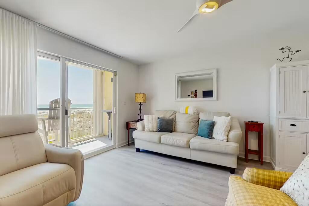 Welcome to your dream beachfront escape! A unique feature of Pelican Isle 102 is its elevated position above the parking garage. While numbered as a first-floor unit, it is not ground level, offering enhanced Gulf views, added privacy, and easy access without sacrificing elevation. This beautifully updated Gulf-front 1-bedroom, 2-bath condo provides direct access to Fort Walton Beach's sugar-white sand beaches. This cozy and inviting beachfront retreat is a rare find on Okaloosa Island, featuring over $60K in renovations and upgrades. Designed for both comfort and functionality, the spacious floor plan includes built-in hallway bunk beds and a sleeper sofa, providing plenty of room for family and guests. The interior showcases luxury vinyl plank flooring with an added sound barrier, creating a quiet and comfortable atmosphere. Beautifully updated bathrooms feature gorgeous walk-in showers and high-end finishes. Enjoy a full-size washer and dryer plus a newer HVAC system for comfort and efficiency. The open-concept kitchen offers granite countertops, stainless steel appliances, a tile backsplash, and ample storage, making it ideal for entertaining or preparing meals after a day at the beach. The living area is warm and welcoming, highlighted by a charming faux fireplace that adds character and ambiance. Your private Gulf-front balcony, furnished with Polywood seating, is the perfect place to enjoy morning coffee, coastal breezes, and breathtaking beach sunsets. Turnkey!
