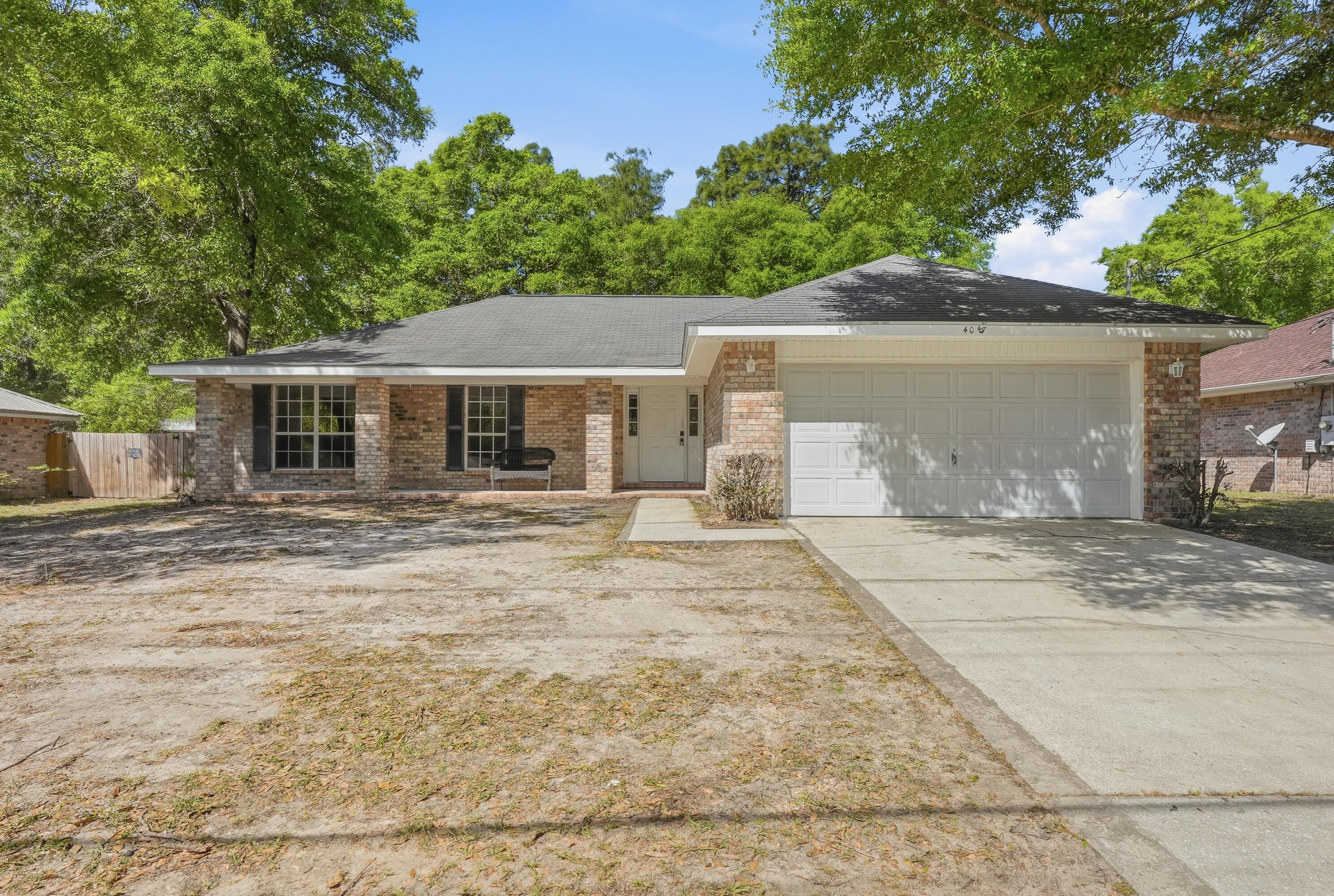 Welcome home to this beautifully maintained brick residence offering comfort, space, and convenience! Featuring a desirable split floor plan, the private primary suite is tucked away on one side of the home, while the additional bedrooms are located on the opposite end--perfect for added privacy.  Step inside to soaring cathedral ceilings that create an open and airy feel, complemented by fresh interior paint and brand-new carpet throughout. The inviting living area is anchored by a cozy fireplace, making it the perfect focal point for relaxing evenings and gathering with family and friends. The home also includes a spacious two-car garage and a fully fenced backyard--ideal for pets, play, or outdoor entertaining.
Conveniently located just off I-10, this property offers easy access to shopping, dining, and commuting routes--all with the added benefit of no HOA!
Move-in ready and thoughtfully cared for, this home is a must-see!