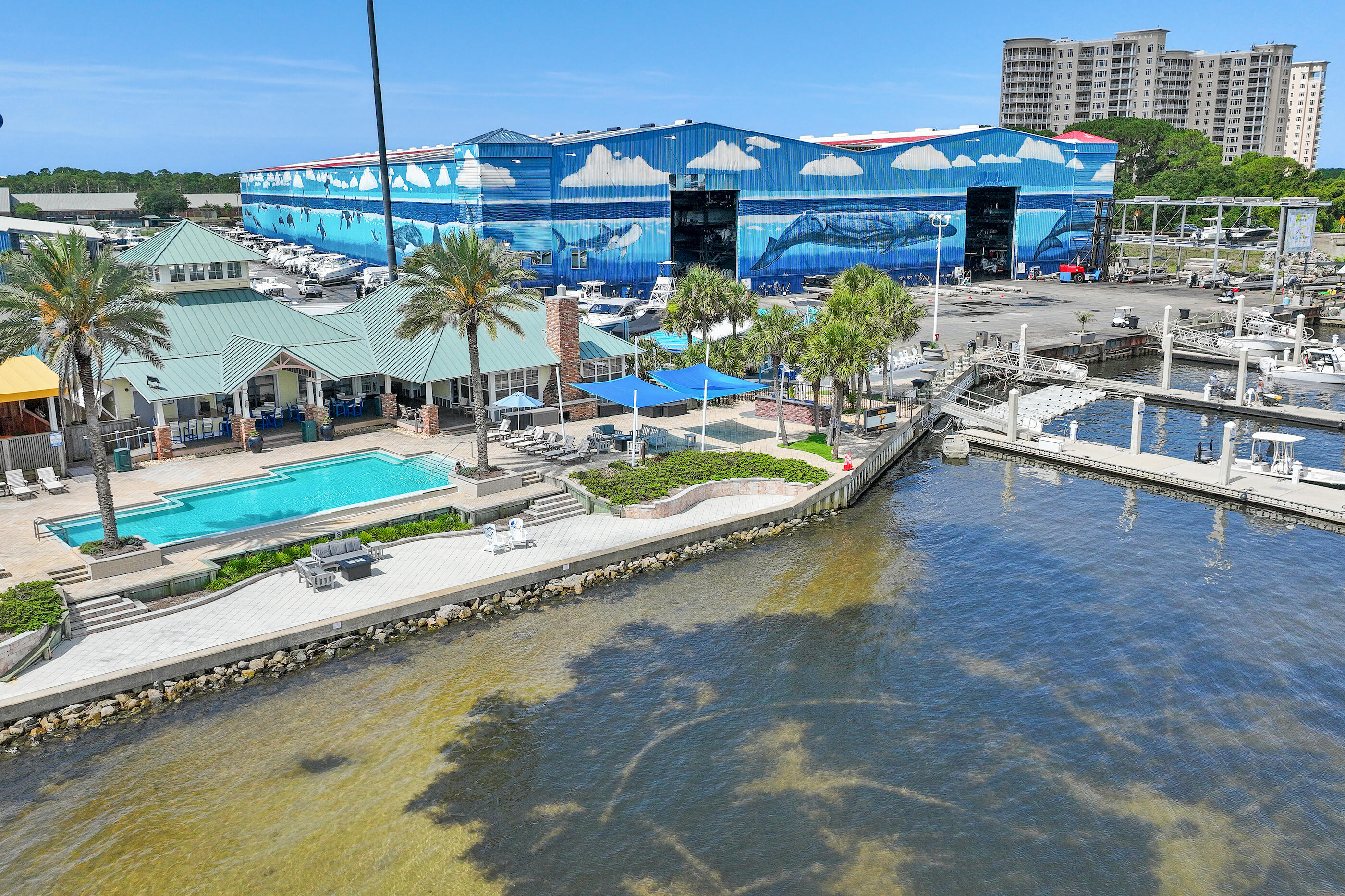 One of the largest and tallest dry storage slips available, this space is ideal for accommodating boats with towers while providing exceptional convenience and protection. Legendary Yacht Club offers a premier full-service marina experience with exceptional amenities designed for boat owners who value convenience, comfort, and protection for their vessels. The waterfront clubhouse features a beautifully appointed restaurant, owners' lounge, bar, swimming pool, summer kitchen, bathhouse, and additional gathering spaces.

Marina services include fuel, food and beverage options, ship's store supplies, and non-warranty parts available at cost. Owners also enjoy discounted service labor of up to 35%, along with unlimited launches and haul-outs. Each vessel removal includes an engine flush and soap wash for added convenience.

The state-of-the-art dry storage facility is engineered to withstand winds up to 125 MPH, providing outstanding protection from harsh weather, salt exposure, and the Florida sun. Simply arrive, unload your gear, and let the professional staff handle the rest.

With easy access to Choctawhatchee Bay, Crab Island, and the Gulf of Mexico, Legendary Yacht Club is the ideal home port for your boat. Experience outstanding service, first-class amenities, and endless opportunities to enjoy life on the water.