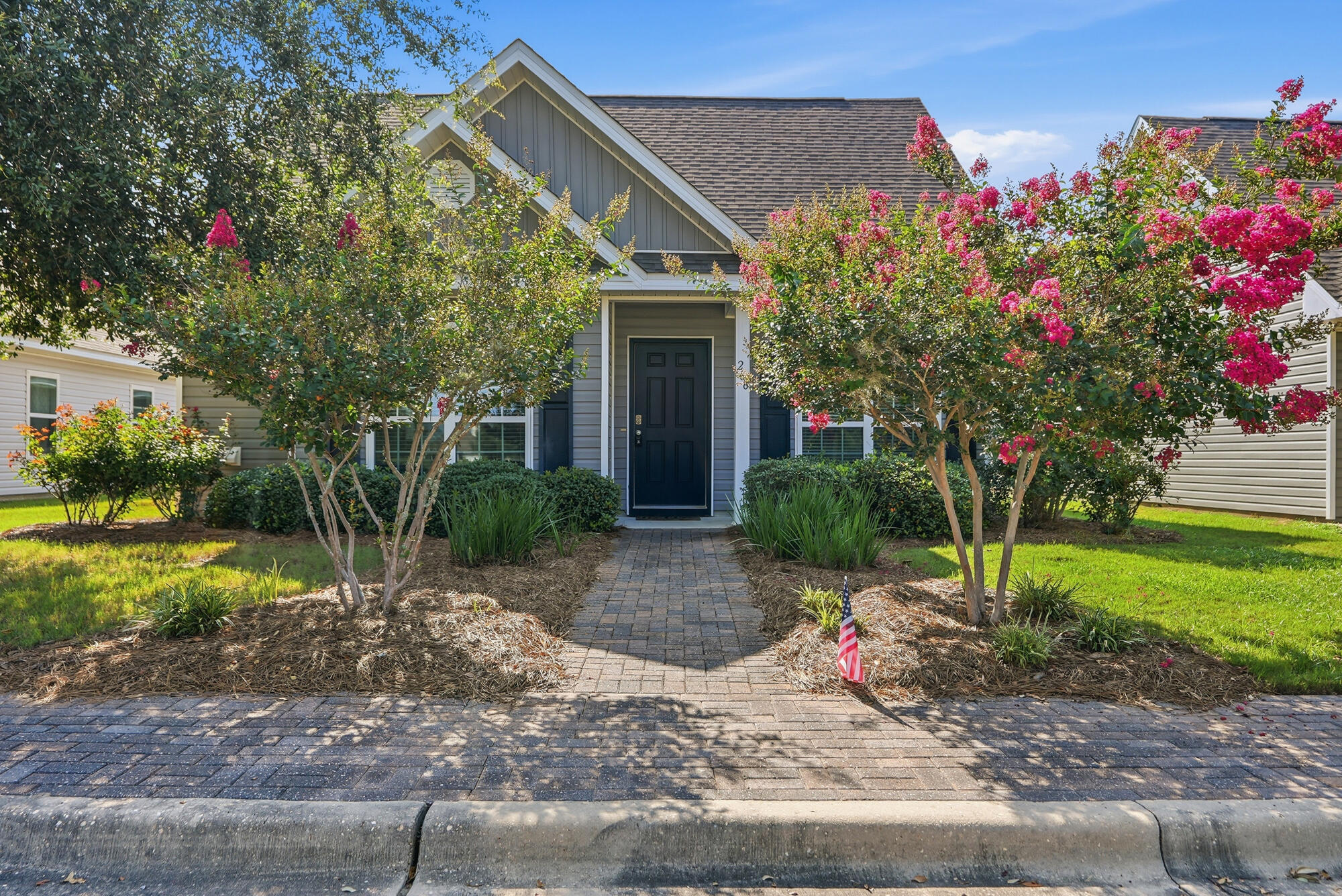 Welcome to this charming Florida cottage nestled in the highly sought-after Schooners Landing at Hammock Bay community. Offering 3 bedrooms, 2 bathrooms, and an ideal location directly across from Central Park, this home is just blocks away from the resort-style amenities that make Hammock Bay one of the area's most desirable neighborhoods in Freeport. The home is move-in-ready, and includes all the appliances. 

Step inside to a bright open floor plan designed for both everyday living and effortless entertaining. The spacious kitchen features a breakfast bar, ample cabinetry, a pantry, and overlooks the dining area, where large windows provide peaceful views of the open lawn & park across the street. 

The thoughtfully designed split-bedroom layout offers privacy for the primary suite, while two additional bedrooms and full bathroom are positioned at the front of the home for family, guests, or a home office. 

The spacious primary retreat features a ensuite bathroom complete with double vanities, a soaking tub, separate walk-in shower, and a walk-in closet.

Enjoy a truly low-maintenance lifestyle with HOA services that include the lawn mowing, fertilization, mulching, and cable -- giving you more time to take advantage of Hammock Bay's exceptional amenities, including resort style pools, state of the art fitness center, parks, walking trails, pickle ball, tennis, basketball courts, playgrounds, grocery store, food trucks, brewery, and more! Whether you're searching for a primary residence, second home, or investment opportunity, this beautifully maintained home offers all the comfort, convenience, and an unbeatable location in the heart of Hammock Bay. Nearby schools, restaurants, entertainment, and of course the gorgeous South Walton beaches! This is a great opportunity to purchase a move-in-ready home in one of the fastest growing cities in the USA. Don't miss out on this one!