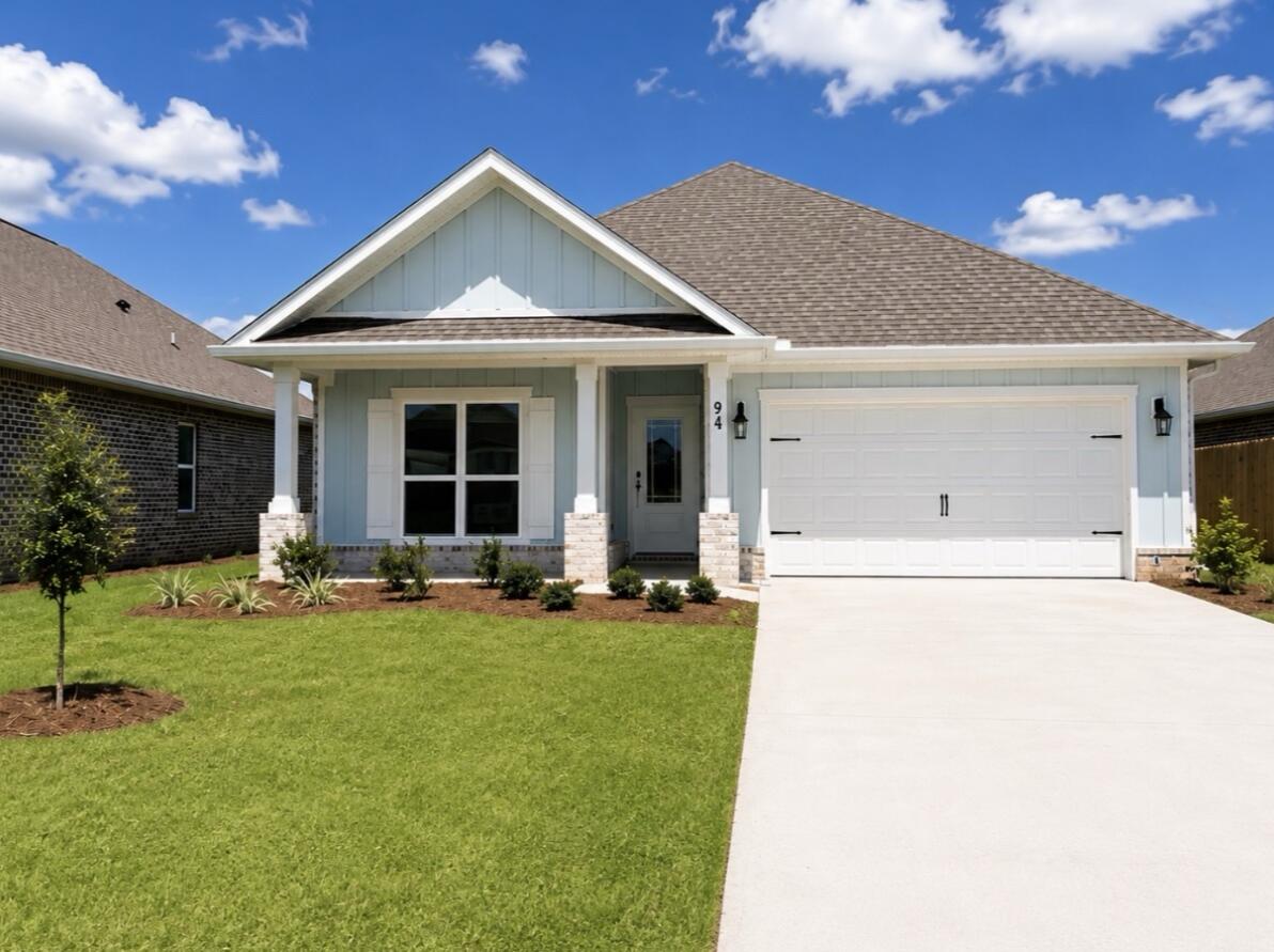 Welcome to 94 Gray Owl Drive, a move in ready home at Owls Head Farms in Freeport, Florida. This home offers an open and spacious layout designed for comfortable living.

The kitchen is equipped with an appliance package that includes a smooth top stove, microwave and dishwasher as well as an undermount single basin sink with a dedicated water filter faucet and a functional center island. Modern finishes of the kitchen include quartz countertops, white upper and lower cabinetry and brushed nickel plumbing fixtures. The kitchen opens directly to the dining area and living room, creating a seamless space for relaxation or entertaining guests. The high 9' ceilings and additional tray ceilings in the living and primary bedroom create boosts the luxurious feel in this home.

The primary bedroom is nestled at the back of the home and features a private bathroom with a shower, dual vanities, a large soak tub, and a spacious closet. Three additional bedrooms, a second full bathroom, and a separate laundry room provide both practicality and comfort. There is a coat closet and linen closet in the entry hallway for added convenience. This home has EVP flooring in the common or shared areas of the home and each bedroom has carpet.

The exterior of this home features covered front and back porches that extend your living space, ideal for enjoying Florida's weather. The 2-car garage and large laundry room are just off the kitchen for ease when you're unloading the car.