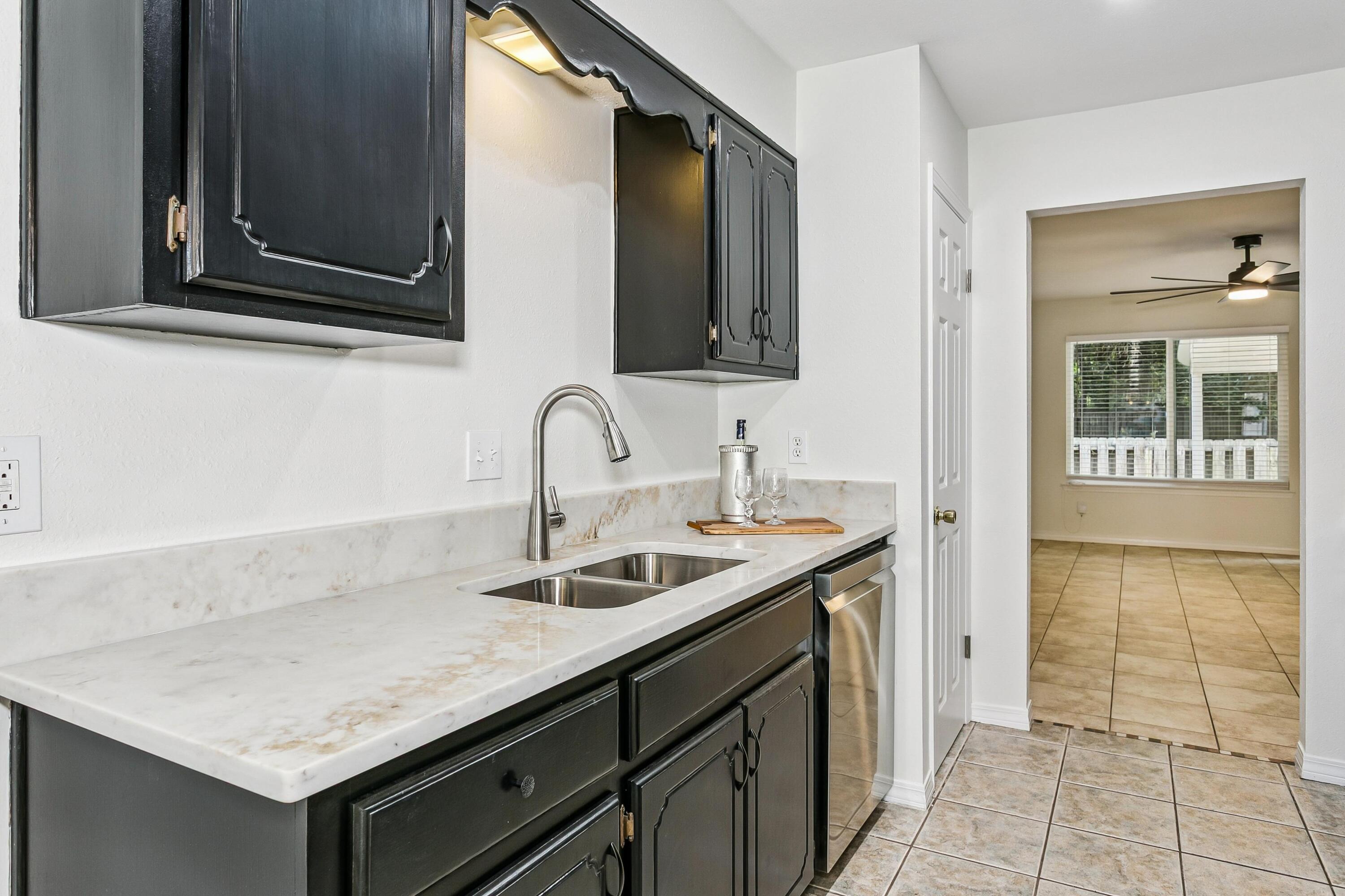 Welcome to Emerald Gardens, one of Fort Walton Beach's best-kept secrets! This beautifully updated home offers the perfect blend of comfort, convenience, and low-maintenance living. Recent improvements include an updated kitchen featuring a quartz countertop, new undermount sink and faucet, and appliances(2024). Throughout the home, you'll find durable tile and luxury vinyl plank flooring, along with updated tiled showers for a fresh, modern feel. 
The spacious primary suite is conveniently located on the first floor, providing privacy and ease of living. Upstairs you will find 2 additional bedrooms and a full bath. Need extra space? You'll love the flexible office/bonus room featuring a skylight that fills the space with natural light and a large closet for added storage. Perfect as a home office, guest suite, media room, or easily utilized as a 4th bedroom. A one-car garage offers additional storage and parking, while hurricane-rated windows and doors provide added peace of mind, energy efficiency and lower insurance . 
Residents enjoy access to community amenities including a sparkling pool (super close to your door) and additional parking for boats, RVs, and recreational toys. The HOA maintains front yard landscaping and covers roof replacements, helping to simplify homeownership. 
The location is hard to beat--just minutes from both Eglin Air Force Base and Hurlburt Field, with shopping, dining, schools, parks, and the beautiful Emerald Coast beaches all within easy reac Whether you're searching for a primary residence, second home, or investment opportunity, this move-in-ready property offers exceptional value in a highly desirable community.

Noteable updates/upgrades:  Appliances 12/2024, Doors & Windows 4/2025, Fans 12/2024, Gutters/Leafguard 7/2025, Kitchen Quartz, sink & faucet 5/2026