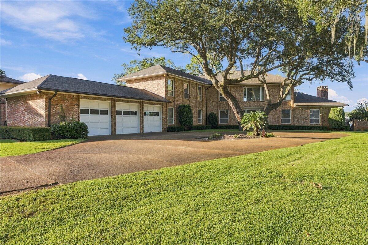 A rare opportunity to own one of Fort Walton Beach's distinctive waterfront residences. Set along the tranquil waters of Cinco Bayou, 259 Sleepy Oaks Ln NW offers an impressive 5,279 square feet, 4 bedrooms, 5.5 baths, 3 car garage, gunite pool, and covered dock with boat lift--an exceptional combination of size, waterfront amenities, and location that is seldom available in Fort Walton Beach.

Built in 1986, this stately residence was designed to embrace its remarkable setting. Expansive windows and French doors capture sweeping water views and fill the home with natural light, creating a seamless connection between the interior and the waterfront beyond. Generously proportioned living and entertaining spaces are enhanced by hardwood floors, extensive millwork, crown molding, built-ins, fireplaces, soaring ceilings, and elegant architectural details throughout.

The home's expansive layout offers tremendous flexibility for both everyday living and entertaining on a grand scale. Multiple gathering areas provide space for formal and casual living, while generously sized bedrooms create private retreats for owners and guests. Throughout the home, water views serve as a striking backdrop and reinforce the sense that this is a property designed around its exceptional location.

Outdoors, the residence becomes a true Florida waterfront retreat. A private pool provides the centerpiece for outdoor entertaining, while the covered dock and boat lift put boating right in your backyard.