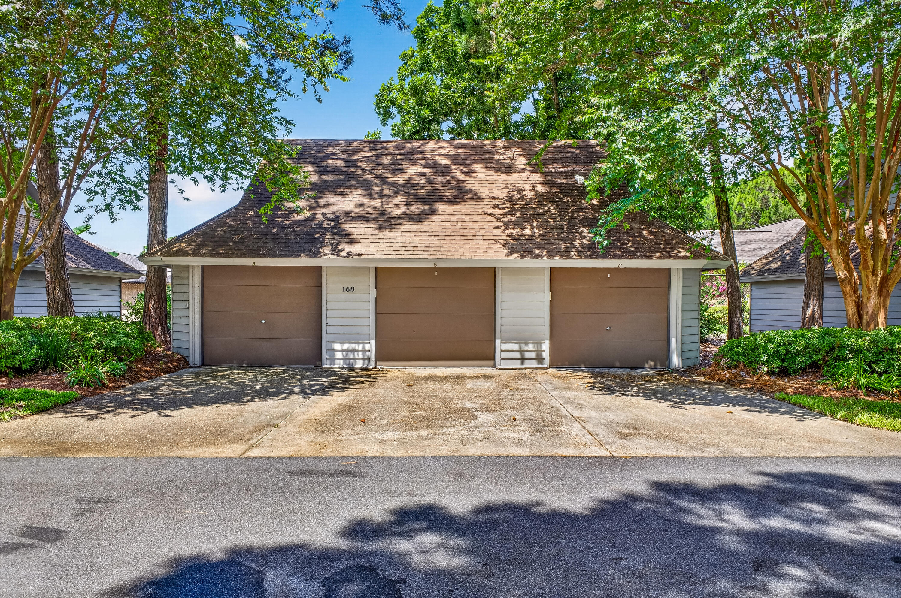Rare opportunity to own a deeded single-car garage in Sandestin Golf and Beach Resort! Located within the Fairways community, this garage is available to any Sandestin property owner--you do not have to own a residence in Fairways to purchase it. The building consists of three separately deeded garage bays, with Unit C ideally positioned as the right-side end unit. This garage features a convenient rear egress door, freshly painted interior, and electrical service already in place. Intended for residential storage use only, it's the perfect space for your golf cart, vehicle, beach equipment, bicycles, seasonal décor, or additional household storage. Don't miss this chance to add valuable storage and convenience within the resort.