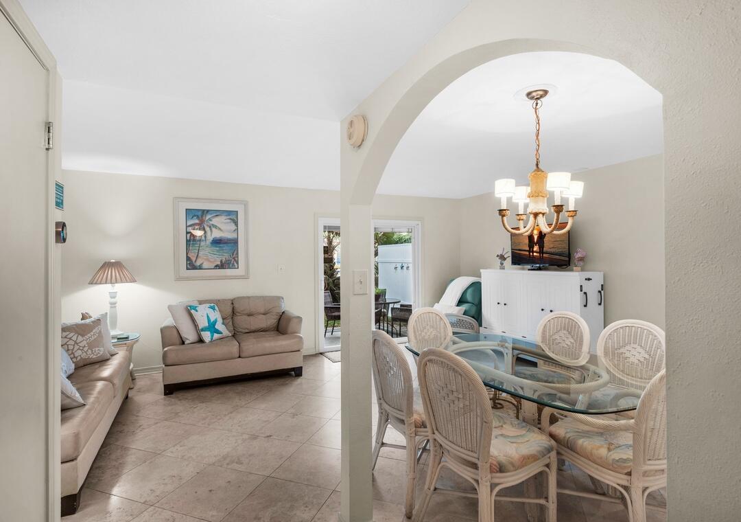 Must see this fantastic turn key rental steps from the beach! This 1289 square foot 3 Bedroom 2 1/2 bath end unit t/h style condo offers a great opportunity to own one of the nicest condos at South Bay by the Gulf. Solid comfortable upscale furniture, quality updated white kitchen cabinets with Corian  countertops. Knock down ceiling, 18' Diagonal Travertine downstairs and LVP upstairs. Upgraded sliding glass integrated blinds patio door. Patio brick pavers and awning provide a private outdoor oasis for grilling and entertaining.
Only steps away from South Bay's beautiful 300' of pristine beach, this family oriented pet friendly community of 109 townhomes occupies 14 landscaped acres spanning Hwy 98 to the Gulf of America.  Quiet and relaxing yet convenient to all of Destins many attractions.