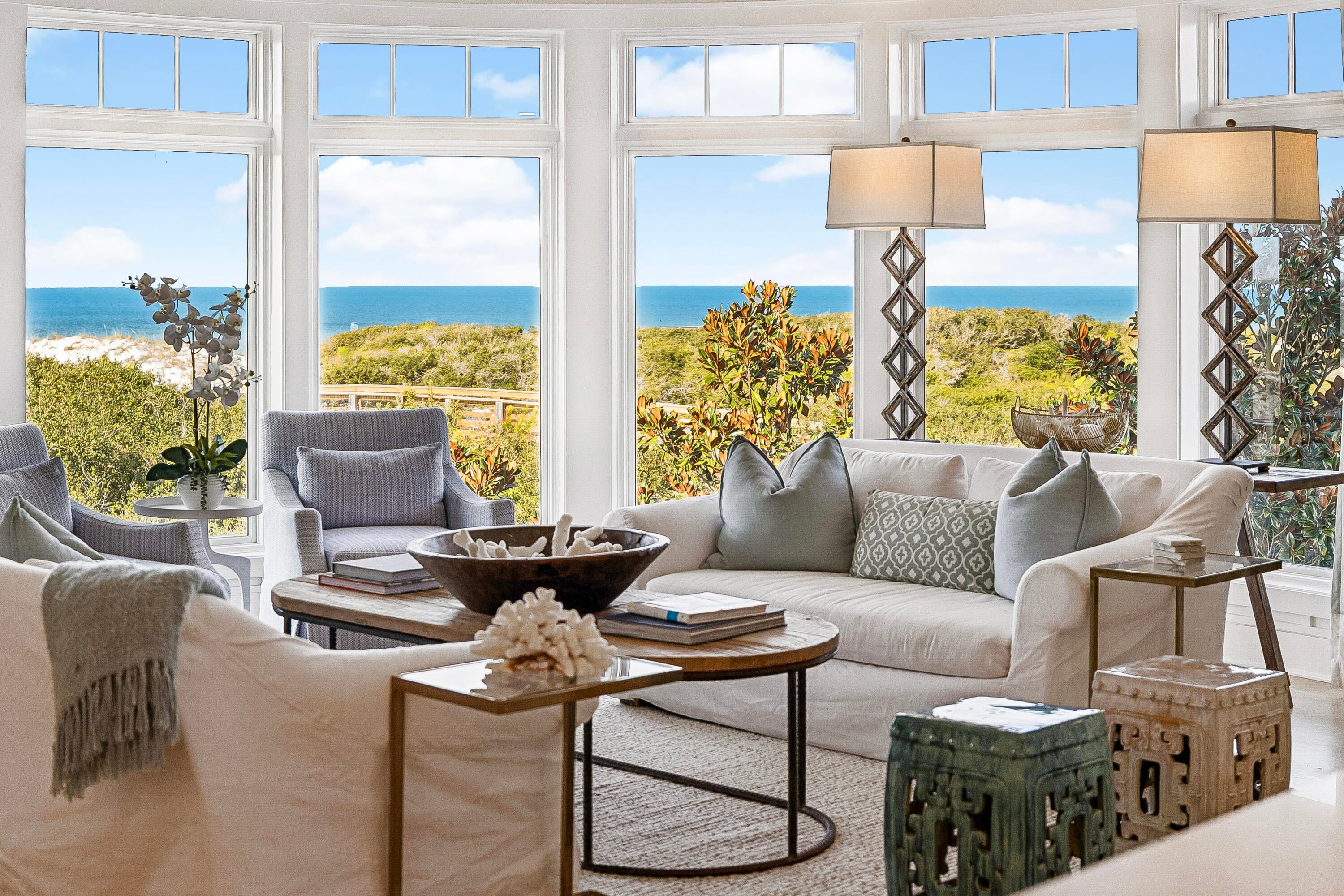 Perched above the dunes at the southern end of Watersound Beach, Compass Point 308 captures the gulf from an especially beautiful vantage point. This single-level corner residence is defined by sweeping water views from every room, with expansive curved rotunda windows drawing the shoreline, rolling dunes and beach boardwalk into the living spaces. 

Inside, the 1,818-sq.-ft. residence has been thoughtfully refreshed with a renovated kitchen and bathrooms, creating a polished backdrop for easy coastal living. The open living, dining and kitchen spaces flow naturally toward the gulf, while the primary suite enjoys both east and west water views and direct access to its own balcony. Two additional ensuite guest suites including a queen-sized bunk room allow the residence to comfortably accommodate family and guests.

Just beyond the building, Watersound's boardwalks lead through the dunes to the beach, with golf-cart-friendly access that makes trips to the sand effortless. Owners and guests of Compass Point have their own private pool, while the Dunesider pool is also steps away. Watersound's trails, parks, fitness center and more than a mile of gulf-front coastline further extend the experience beyond the residence.

A dedicated covered parking space, covered golf cart parking, private storage, elevator access and in-residence laundry make coming and going as effortless as the setting itself. With its corner position, uninterrupted gulf views and immediate connection to the beach, Compass Point 308 is a rare expression of gulf-front living within Watersound.