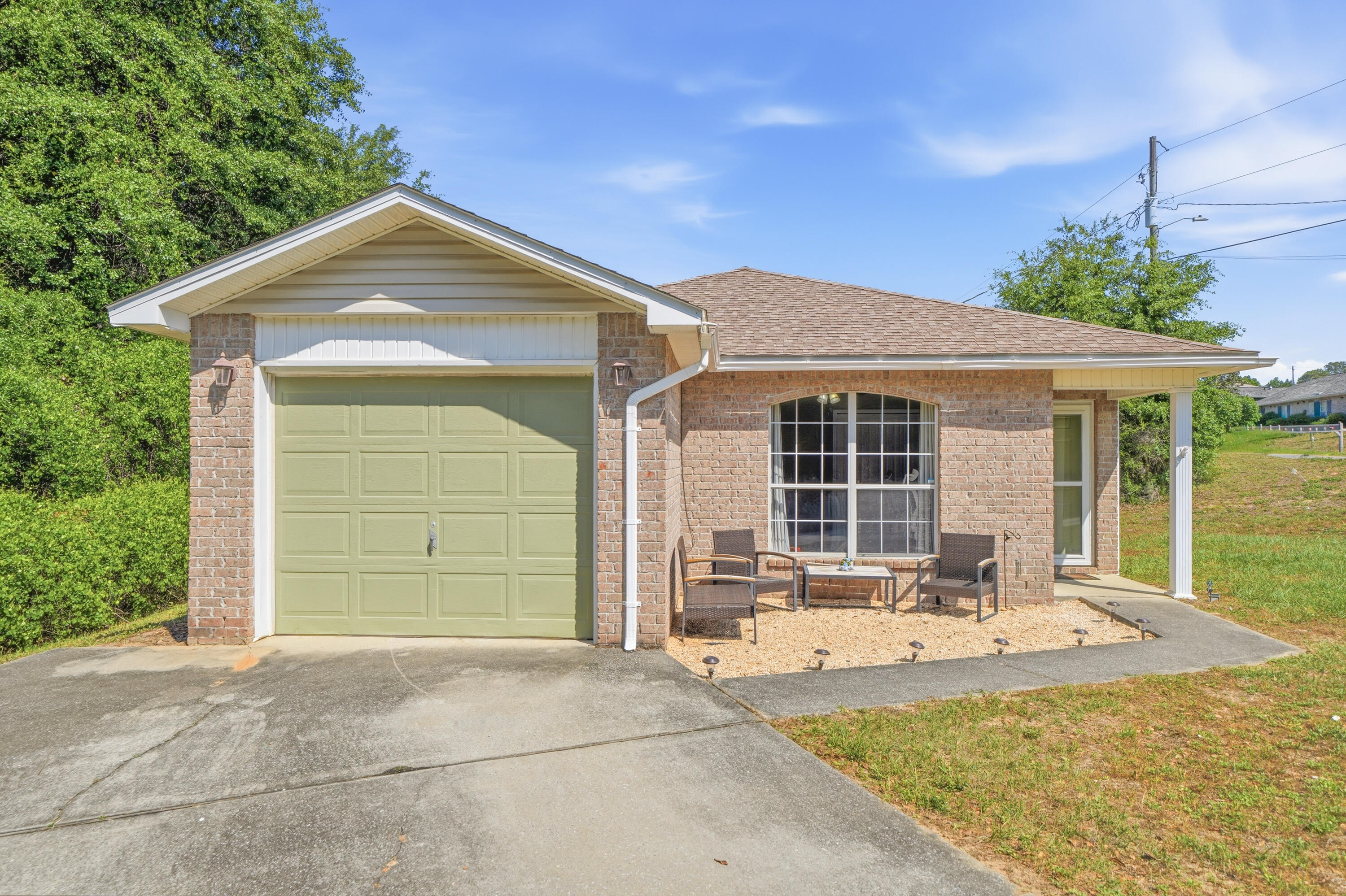 Take advantage of an assumable FHA mortgage - a rare opportunity in today's market! Located in the highly desirable South Crestview area just off PJ Adams, this 3 bed, 2 bath home sits on a spacious 0.33-acre lot, offering much more outdoor room than you typically find in this part of town! The private back and side yard extends into a wooded area, giving you plenty of flexibility to add on, build a detached garage or covered carport, and/or create the outdoor oasis that you've been longing for.

Big ticket items have already been taken care of for added peace of mind, including a roof replaced in 2020, HVAC in 2019, and a brand new water heater in 2026. Inside, the home features a large, open kitchen with plenty of counter and cabinet space, making it perfect for entertaining and also offering an open, spacious feel. The interior offers a great canvas to make it your own with a few simple updates. Don't miss this one and schedule your showing today!