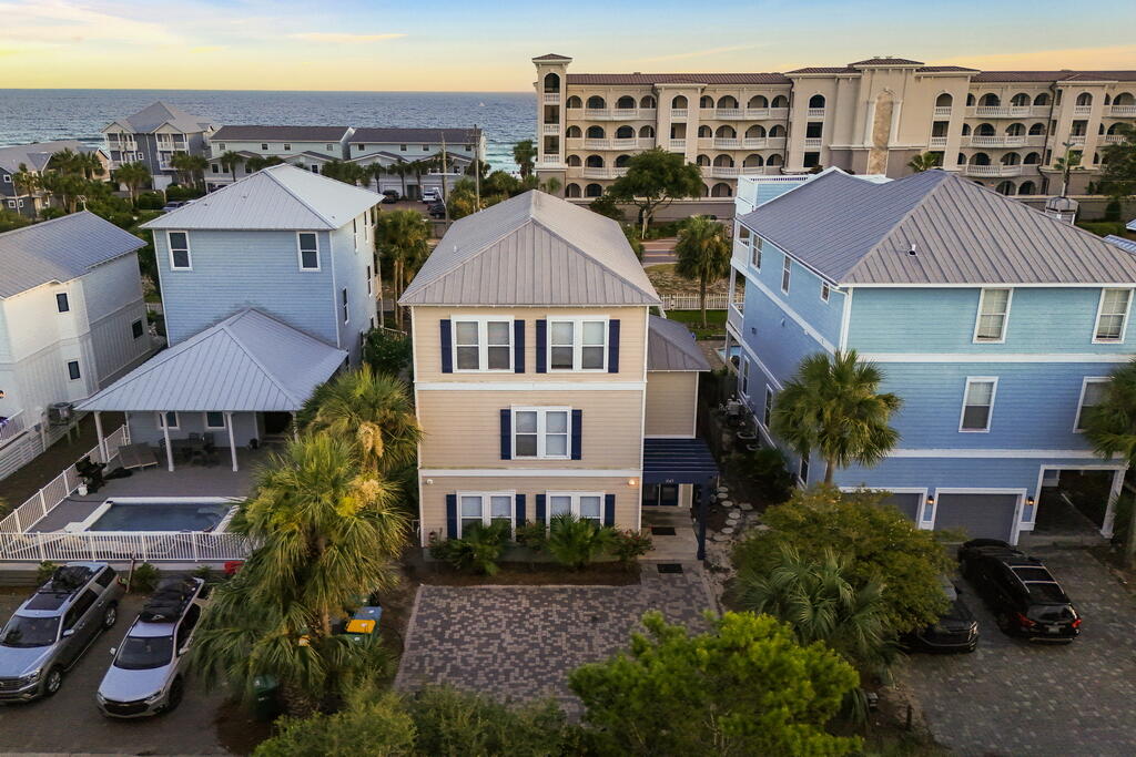 First impressions matter. And when I walked into 3149 Scenic Highway 98 for the first time it immediately felt like a home made for family and for making memories. The floor plan is perfect for multiple families to share the home and still feel like they each have their own space. The bedrooms are spread out across all three floors, and all three levels have their own common area/living room. So, when multiple families share the home they don't feel like they're stacked on top of one another. The first floor kitchenette being located next to the pool area is also a great detail of the floor plan. I have young children, so I know the value of having cold drinks and snacks on hand by the pool when the Summer sun starts to get hot. This home's outdoor space really blew me away when I first walked outside. The covered porch is massive and provides a large shaded space to retreat from the sun while still enjoying the outdoors. The pool (30'x15') was larger than I expected, and the back gate by the pool makes walking to the beach easy. The Barracuda Street beach access is across from the house, and it has a crosswalk making it safe and easy for parents to take their kids to the beach. When you return, the outdoor shower makes it easy to rinse off the sand before coming inside. After a decade of selling real estate on the Emerald Coast I've learned that most buyers and renters share these three priorities when looking for a beach home: quick and easy beach access, nearby dining & entertainment options, and a private heated pool. The heated pool is a key because Northwest Florida experiences cold snaps in the Fall and Winter months, so many vacation renters filter their online searches for homes with a heated pool, and if you don't have one then you may not show up in a would-be renter's search. It's also important if you plan on staying at the home and want to be able to use your pool year-round. 3149 Scenic Highway 98 checks every one of these boxes. It's one row back from the beach, and it has a 30'x15' private & heated pool surrounded by a covered patio. It's located one mile by car or LSV (street-legal golf cart) from the Destin Commons shopping & dining complex as well as the award-winning public golf course at Regatta Bay. All of the places below are accessible from the home by LSV:

Barracuda Street Beach Access.........................1-min walk
Camille's (seafood, sushi, brunch).....................0.4mi
The Henderson Rooftop Bar..............................0.8mi
Whole Foods......................................................0.8mi
Destin Commons (shopping, dining, movies)......0.9mi
Uncle Buck's Fish Bowl (bowling/arcade)...........0.9mi
Jackacuda's (seafood & sushi).........................1.1mi
Regatta Bay Golf Course.................................1.7mi

This home is located in Crystal Beach, one of the premier vacation rental locations in all of Destin and Miramar Beach, it's the area of town my investment-savvy clients typically gravitate towards. There's three main benefits to being in Crystal Beach: 1) no HOA fees 2) ample public beach accesses. Most streets have a dedicated access which helps spread the crowds out and leads to a less crowded beach experience. 3) Proximity to the Destin Commons, which is the main shopping, dining, and entertainment hub in Destin. It's also in close proximity to many of the best restaurants in town. This is important both for personal enjoyment and it also matters a great deal to renters. So, if you plan on renting the property, then this area of town is ideal for that. 

Floor plan

First Floor
Upon entering the home there's a good sized landing space. To the right of the front door is the staircase leading to the upper levels.To the left is the entrance to the first floor living quarters complete with a kitchenette, living room, dining area, and two bedroom suites that share a full bathroom. This area also leads out to the pool area which includes the large covered patio, 30'x15' pool, grilling area, outdoor shower, and a walkover to the back gate that leads to the nearby beach access.

Second Floor
At the top of the stairs is a hallway. Straight ahead in the hall is a walk-in laundry room as well as an extra full-bathroom that serves as the guest bath for the living room. The hallway is a "T" shape, and going to the left leads to the second-floor master suite which features a king-sized bed and a walk-in closet. The ensuite master bathroom has a walk-in shower, garden tub, and dual vanities. To the right is the large main living room which features an open floor plan incorporating the kitchen and dining area into the flow of the space. It has doors leading out to a 25'x10' balcony that overlooks the pool and gets great sunset views. The balcony has a set of outdoor stairs leading to the pool area, so it's easy to bring food from the kitchen to the poolside. This also allows the guests in the upstairs bedrooms to access the pool without having to go through the downstairs living quarters. 

Third Floor
The final floor starts with a sizable living room/common area. To the left are two guest bedroom suites with a shared full bathroom. To the right is another master bedroom suite, and it's laid out similarly to the one on the second floor. It has a large bathroom with a garden tub, walk-in shower, and a walk-in closet. It has a private 25'x10' balcony that faces the beach and captures some peekaboo water views. It provides an excellent front row seat to Summer sunsets with its Southwest exposure.