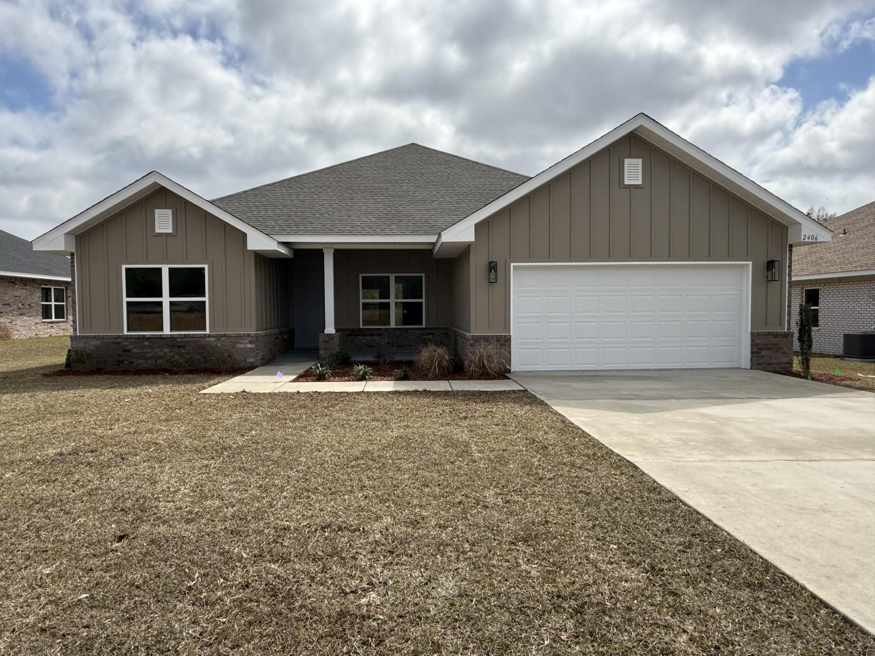 Welcome to Brookwood, our newest neighborhood tucked away in North Crestview-close to Highway 85 and town. This 2,005 sq ft home features a split floorplan with 4 bedrooms and 3 full bathrooms, offering both space and privacy. Built with 3 side brick, Hardie front, and brick skirt, the home showcases a tall roof pitch, covered front and back porches, and a 9' plate creating tall interior ceilings for an open, updated feel. Inside, enjoy granite or quartz countertops throughout, upgraded LVP flooring with carpet only in the bedrooms, modern finishes with black fixtures and hardware. Additional features include a 1/2-acre lot, automatic sprinkler system, fully finished 2 car garage and a 10-year bonded builders' warranty! Brookwood combines style, quality and convenience a charming location. Screened in Back Porch and Blinds throughout!