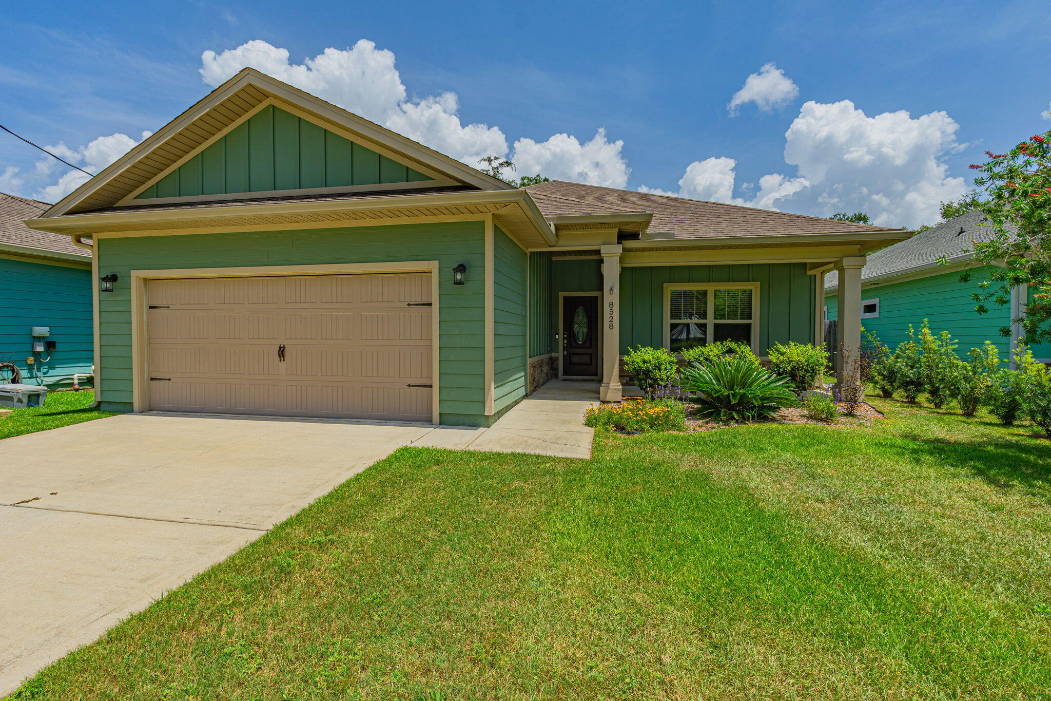 1/2 OFF FIRST MONTHS RENT FOR FULLY QUALIFIED APPLICANT. Enjoy comfort and convenience in this beautifully appointed 3-bedroom, 2-bathroom home located in the heart of Navarre. Featuring a spacious open-concept floor plan, this home offers modern finishes, quality craftsmanship, and a prime location just minutes from Navarre Beach. The bright living room, kitchen, and primary suite feature recessed lighting, while luxury vinyl plank flooring flows throughout the main living areas and all three bedrooms. The entryway, kitchen, laundry room, and bathrooms are finished with stylish tile flooring. The well-equipped kitchen includes solid wood soft-close cabinetry, granite countertops, and plenty of storage and workspace. Both bathrooms also feature matching granite countertops and quality cabinetry. The spacious primary suite easily accommodates a king-size bedroom set and includes a large walk-in closet. The en-suite bathroom offers dual vanities, a beautifully tiled walk-in shower with dual shower heads, and a deep soaking tub--perfect for relaxing after a long day. Step outside and enjoy covered front and back porches overlooking a fully privacy-fenced backyard with a sprinkler system and well for irrigation. No smoking.  For pet friendly properties, we use petscreening.com to determine the pet rent amount and deposits. Pet rent is not included in the basic rent. Enrollment in the Resident Benefits Package is required.  Enrollment includes Renters Insurance, Move-In Concierge to set up utilities for you, regular Air Filter Delivery to your door, Identity Protection, and more for a cost of $50 monthly.