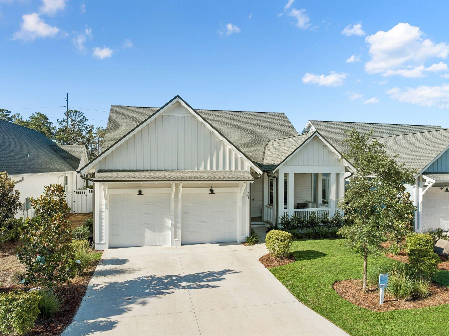 Completed in 2025 and located within The Pines at Watersound Origins, this thoughtfully designed residence blends elevated finishes, generous living spaces, and a highly functional layout tailored for both everyday living and entertaining. Spanning more than 2,700 square feet, the Mistral floor plan features four bedrooms and four-and-a-half baths with an open-concept design that feels both refined and inviting. Inside, 11-foot ceilings, wide-plank Medallion wood flooring, crown molding, and solid-core doors create a polished, cohesive aesthetic throughout. The kitchen serves as the centerpiece of the home with quartz countertops and backsplash, stacked glass cabinetry with integrated lighting, an oversized island, and a premium appliance package including a Wolf range, Sub-Zero refrigerator, Cove dishwasher, microwave drawer, beverage center, and ice maker. A dedicated dry bar enhances the entertaining experience, while expansive sliding glass doors fill the main living area with natural light and create a seamless indoor-outdoor connection.

The spacious primary suite offers a private retreat with upgraded tile selections, a freestanding soaking tub, and an oversized walk-in shower. Each additional bedroom provides comfort and privacy, while custom cabinetry, enhanced laundry storage, Sonos surround sound, and EV charging capability add convenience and functionality throughout the home.

Designed with future outdoor expansion in mind, the backyard is already plumbed for a pool and offers ample space to create a custom outdoor living environment. A covered rear porch, gas line for grilling, and welcoming front porch with gas lantern further enhance the home's outdoor appeal. A GEM golf cart is also included for easy access throughout the community.

Residents of Watersound Origins enjoy access to community amenities including a pool, fitness center, golf course, and miles of walking and biking trails, all just minutes from the dining, shopping, and white-sand beaches of 30A. With no short-term rentals and a strong sense of community, this property presents an exceptional opportunity for those seeking a primary residence or second home centered around quality, comfort, and long-term value.
