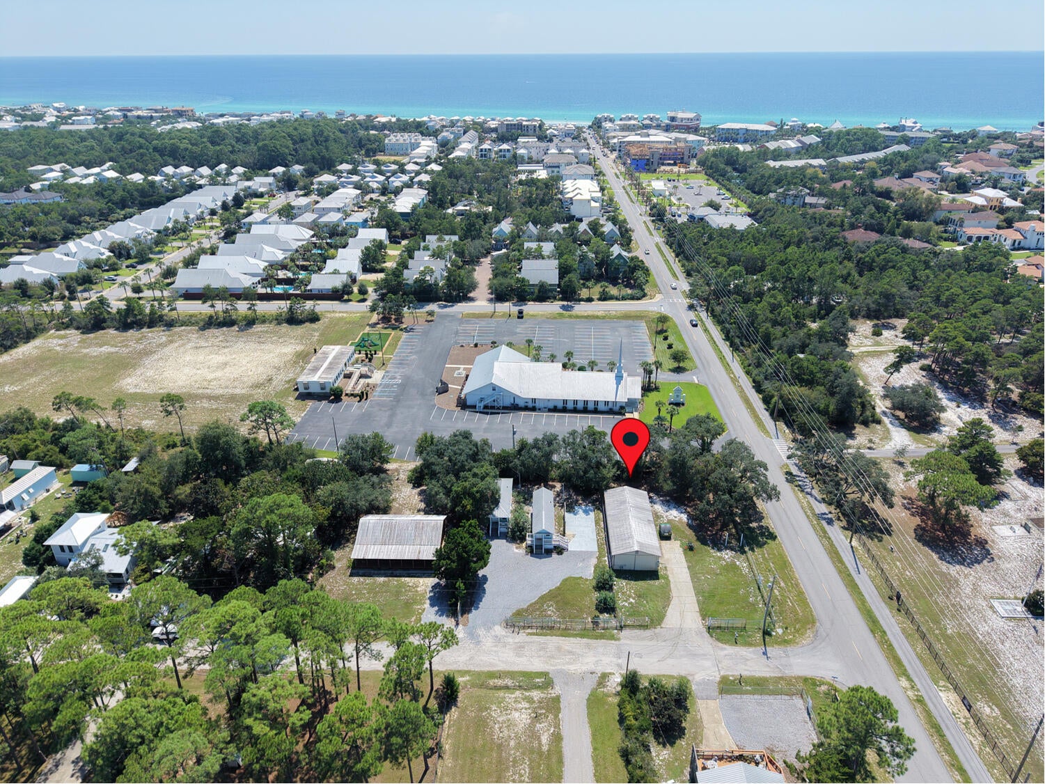 Located in South Walton County, 14 Country Club Dr is in the unrecorded subdivision of Country Club Estates.
Lot 1, Block A - a 1,500 Sq Ft standalone workshop/garage combo, built in 1988.
With 3 bays, a dedicated service area, 1/2 bath and exterior RV pad. The space is sectioned into approximately 24' x 35' and 24' x 24' areas and has natural gas service connection. Current annual lease is $2,200/month.
This unique property offers virtually unlimited possibilities for a buyer seeking for versatile space to store/maintain vehicles, work on craftsman projects or bring the RV for a weekend at the beach. 
This workshop has been the''TLC space'' for race cars, classic car restorations and a variety of other semi-pro projects.
Convenience it the icing on this 7-layer cake - located at the corner of CR-393 and Country Club Dr, the property faces CR-393.

The property is not zoned for commercial use so no need to worry about urban sprawl here. Seller confirmed that Code Enforcement advised that commercial signage is not permitted.

South Walton / Scenic 30A Location
County Hwy 393 provides a convenient Beach-to-Bay connection between Scenic Hwy 30A and the Gulf, and also Hogtown Bayou and Choctawhatchee Bay. The property is approximately 1/2 mile from Gulf Place and Ed Walline Regional Beach Access, where you can enjoy amazing seasonal sunsets and sunrises. Several additional public beach accesses are nearby. No HOA, keep your boat or RV right on your own property. South Walton / Scenic 30A Location
County Hwy 393 provides a convenient Beach-to-Bay connection between Scenic Hwy 30A and the Gulf, and also Hogtown Bayou and Choctawhatchee Bay. The property is approximately 1/2 mile from Gulf Place and Ed Walline Regional Beach Access, where you can enjoy amazing seasonal sunsets and sunrises. Several additional public beach accesses are nearby.
South Walton's unique coastal dune lakes, Grayton Beach State Park and a wide selection of restaurants, shopping and recreation add to the appeal of this location. Just north on 393, Cessna Landing provides a public boat launch, recreational amenities and parking.
With no HOA, keep your boat or RV right on your own property. Short-term rentals are allowed. This section of 393 is golf-cart friendly with a nearby pedestrian/bike path.
