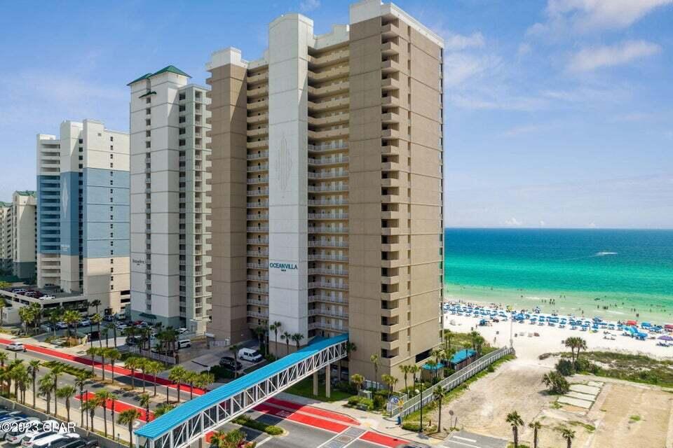 WELCOME HOME! This gulf front condo features an extra large private balcony + deeded outside storage unit. With it being so large, the balcony is perfect for entertaining friends and family or simply relaxing and watching the fabulous sunset views. Beautiful 2 bedroom, 2 bath has all new appliances, flooring, interior painting, new countertops and backsplash, new furnishings and more. Unwind in the master which features a private balcony access, and gulf views. Great living area with electric fireplace and spacious dining room also! The current owner has never rented the condo but with its prime location and clean, well maintained building, this home has strong rental potential! Located in the Heart of PCB, Ocean Villa boasts 2 swimmng pools (outdoor and seasonal heated indoor pool) an oversized hot tub, grilling area, and fitness center with sauna plus steam roon.  The enclosed walkover enssures safety and comfort while crossing the street from the 3-story covered parking deck.
Looking for Luxury, Location, Unbeatable Views - This is the place for you! All data and dimensions to be verified by Buyer.