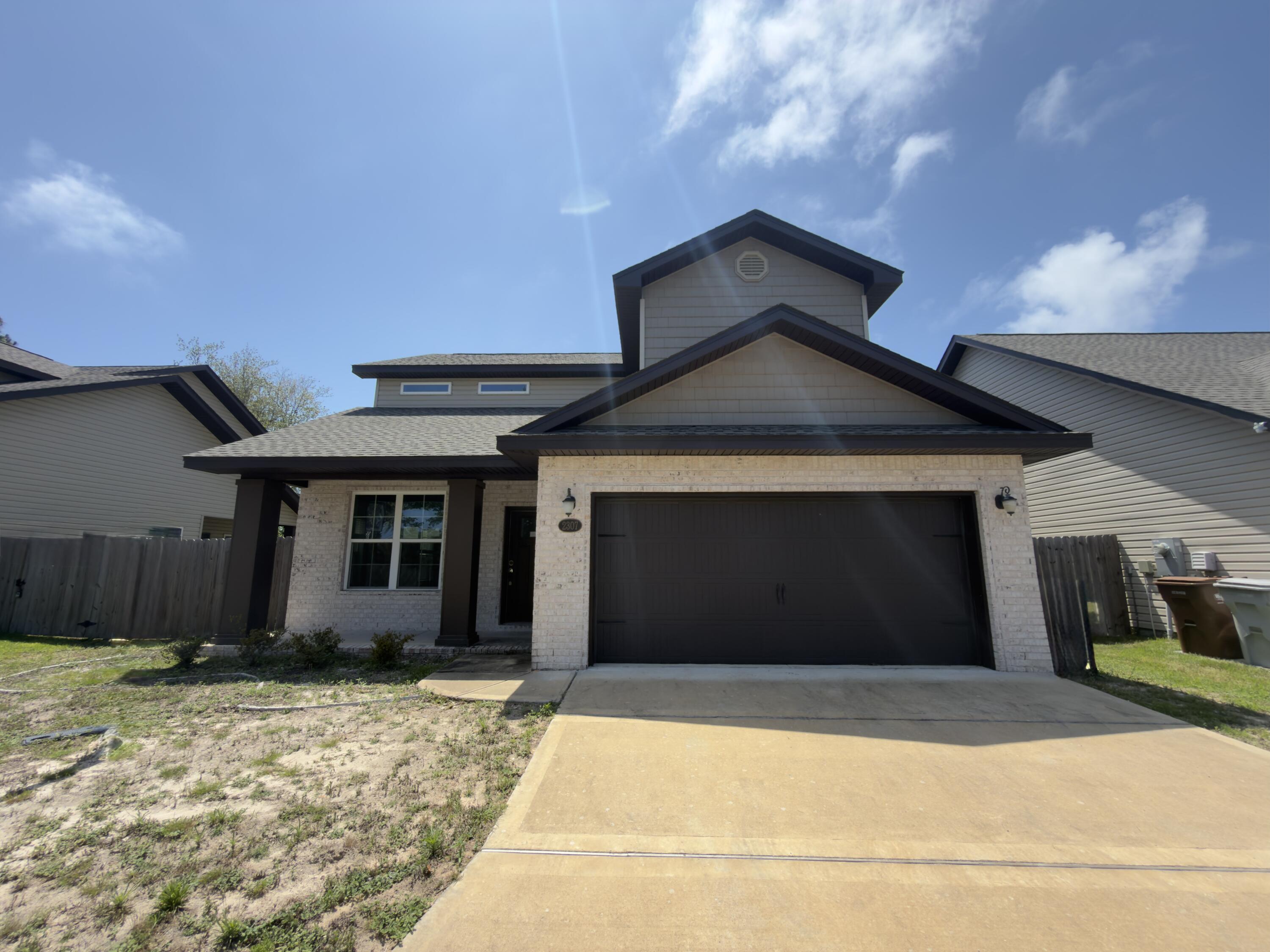 This REO opportunity combines a 2022-built Craftsman home in East Navarre with convenient proximity to Eglin, Hurlburt, and beaches. With 1,978 square feet of living space, this home has 3 bedrooms and 2.5 baths, a separate dining space, guest bath downstairs, and an open floor plan. Inside: LVP throughout, granite tops with modern Shaker cabinets, stainless steel appliances and center sink island. Upstairs, you will find all bedrooms and an open loft that could be an office, play area, home school area and more. The master suite includes a nicely sized bedroom and a bath with an oversized, custom-tiled walk-in shower. The home is being sold strictly as-is, but and should easily qualify for all financing types and may qualify for Vendee Financing. Put this one on your list and call today!