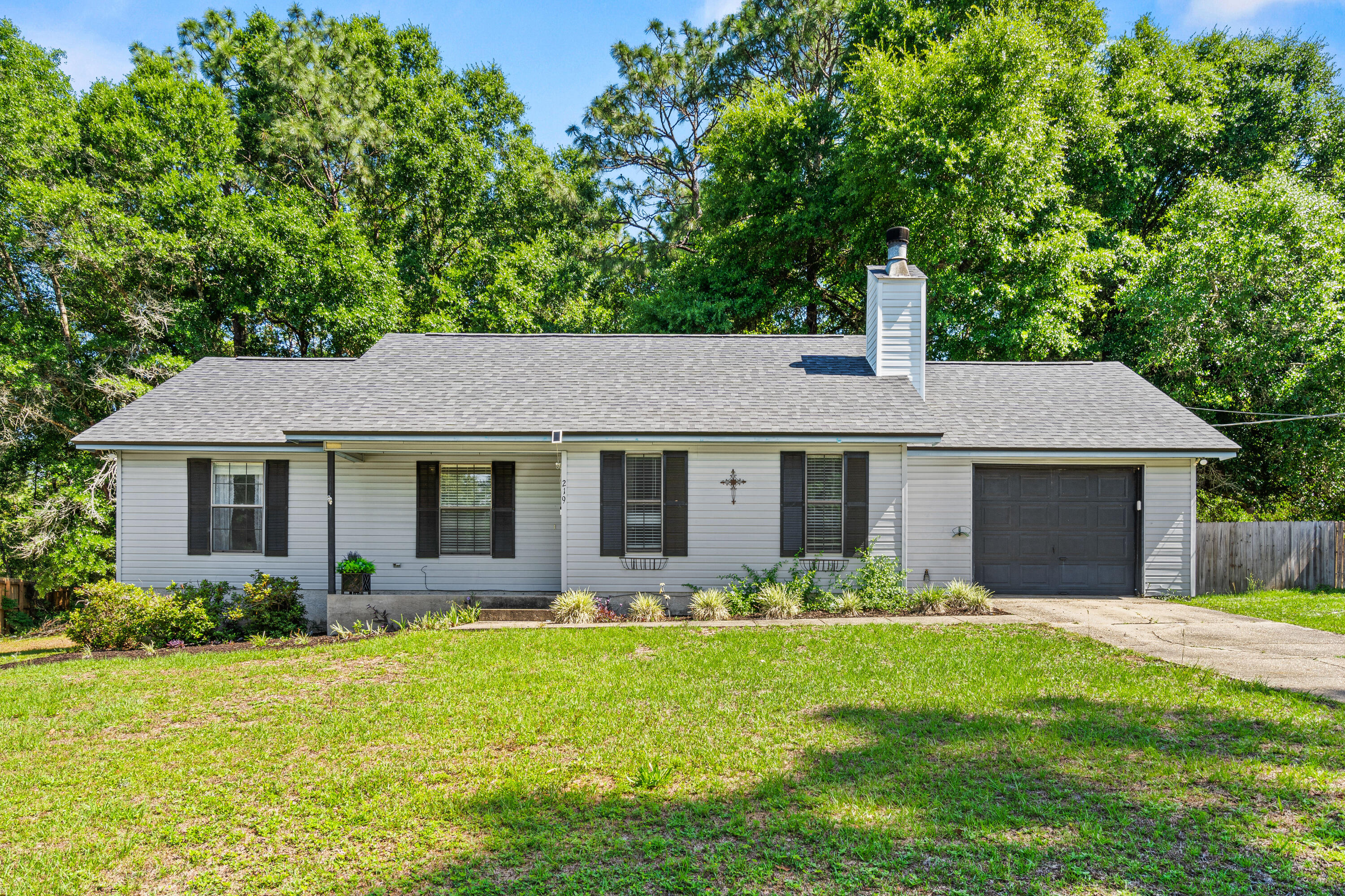 Welcome to Shoal Creek Manor in South Crestview. This 3-bedroom, 2-bath single-family home is situated on a quiet cul-de-sac and offers 1,076 sq ft with a 1-car garage. Features include tile flooring throughout, granite countertops, tile backsplash, updated appliances, and fresh interior paint. Enjoy outdoor living with a back patio deck on a wooded lot. Roof replaced in 2021 and water heater in 2026. Conveniently located near Eglin AFB, Duke Field, and 7th Special Forces Group. Schedule your showing today.